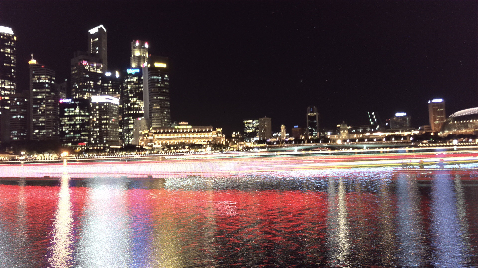 Apple iPhone sample photo. Lights above the water photography
