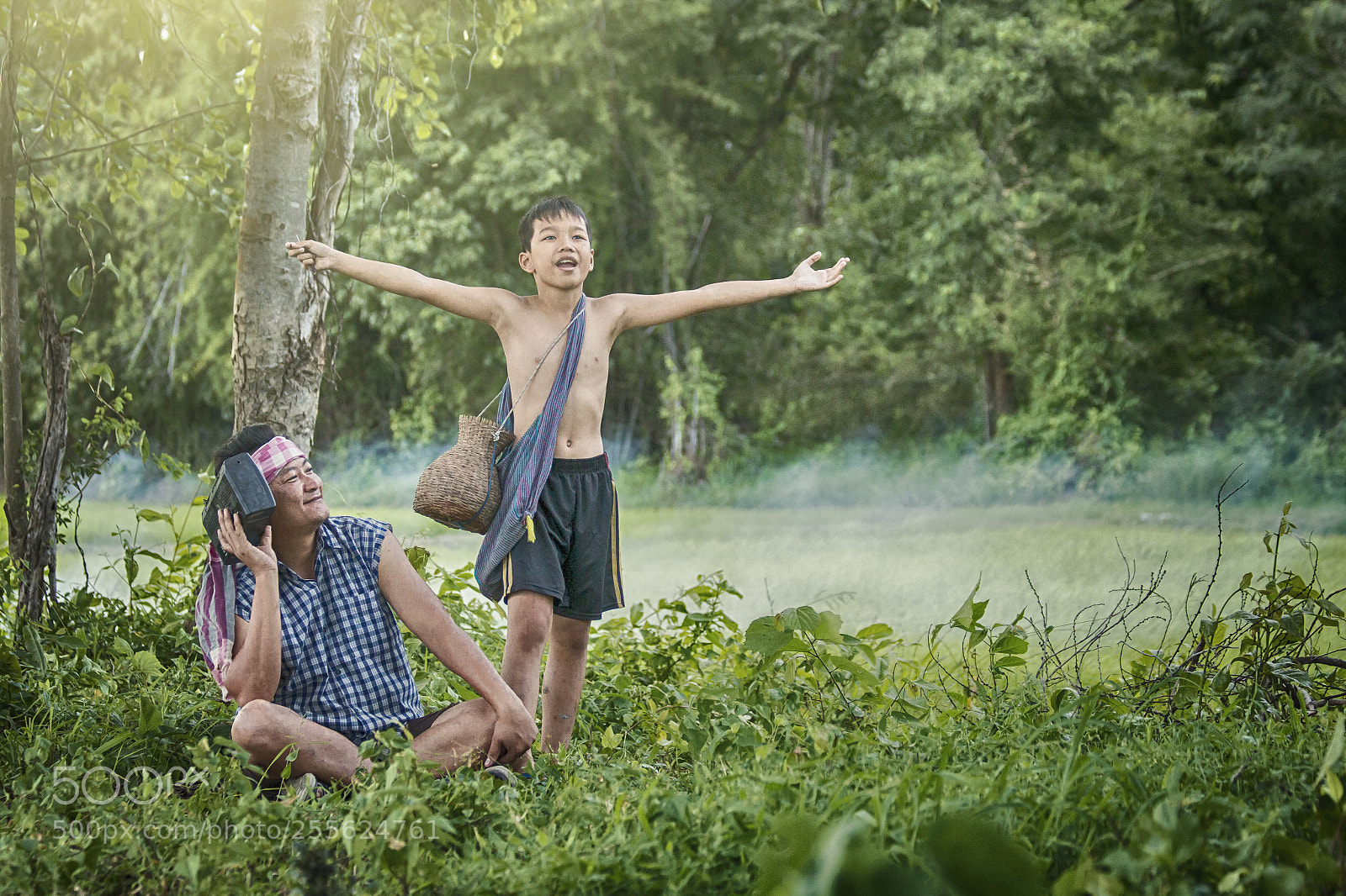 Canon EOS 70D sample photo. Thai farmerwith son listening photography
