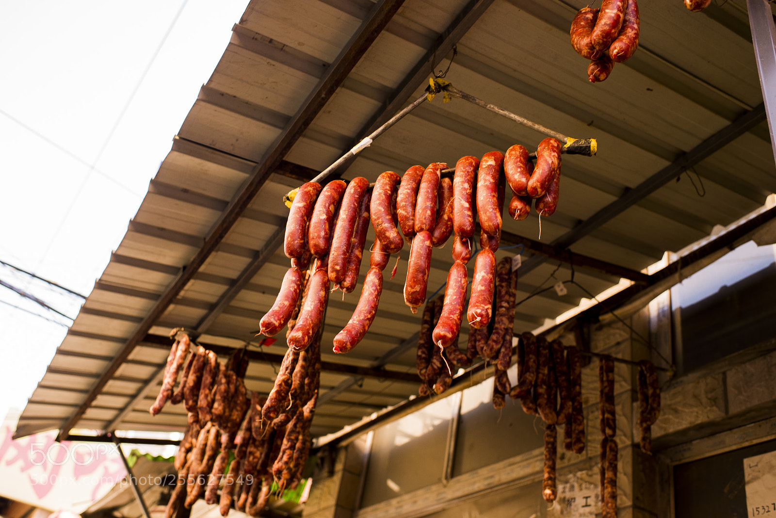 Nikon D610 sample photo. Drying sausages in a photography