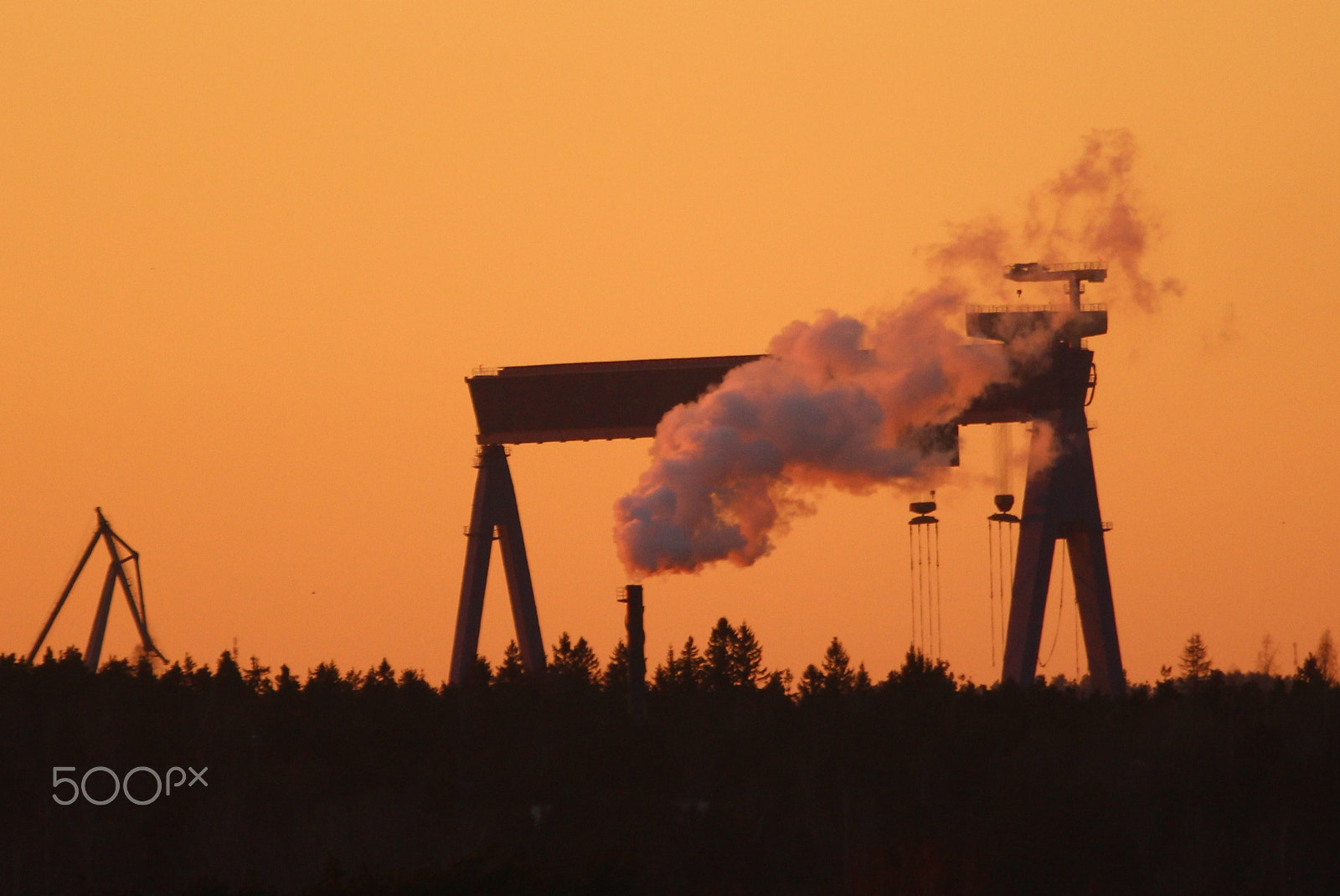 Canon EF 70-300mm F4.5-5.6 DO IS USM sample photo. The dock crane and sunset,,,smoky chimney. photography