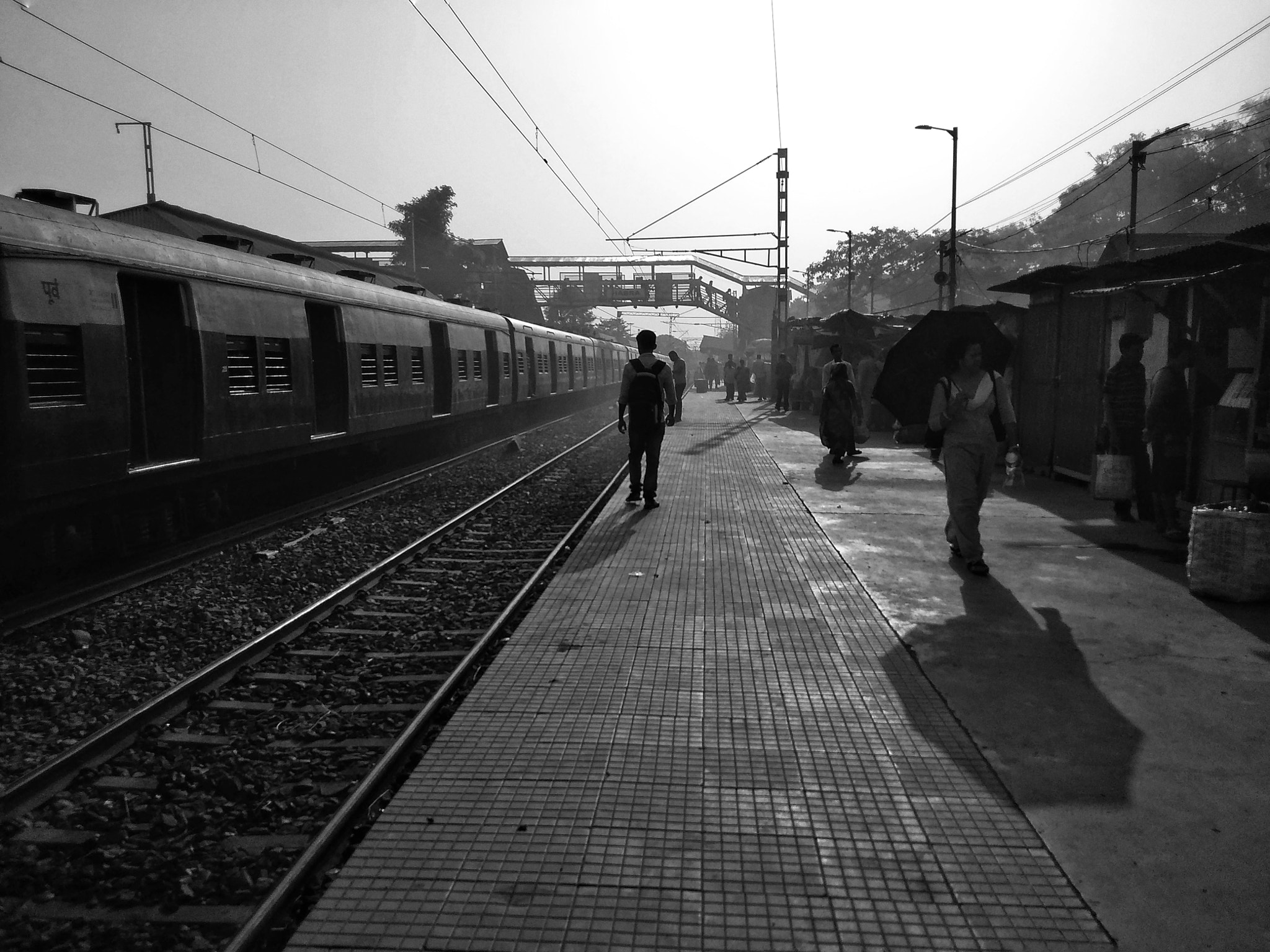 Xiaomi Redmi 5A sample photo. Walking on a colourless station photography