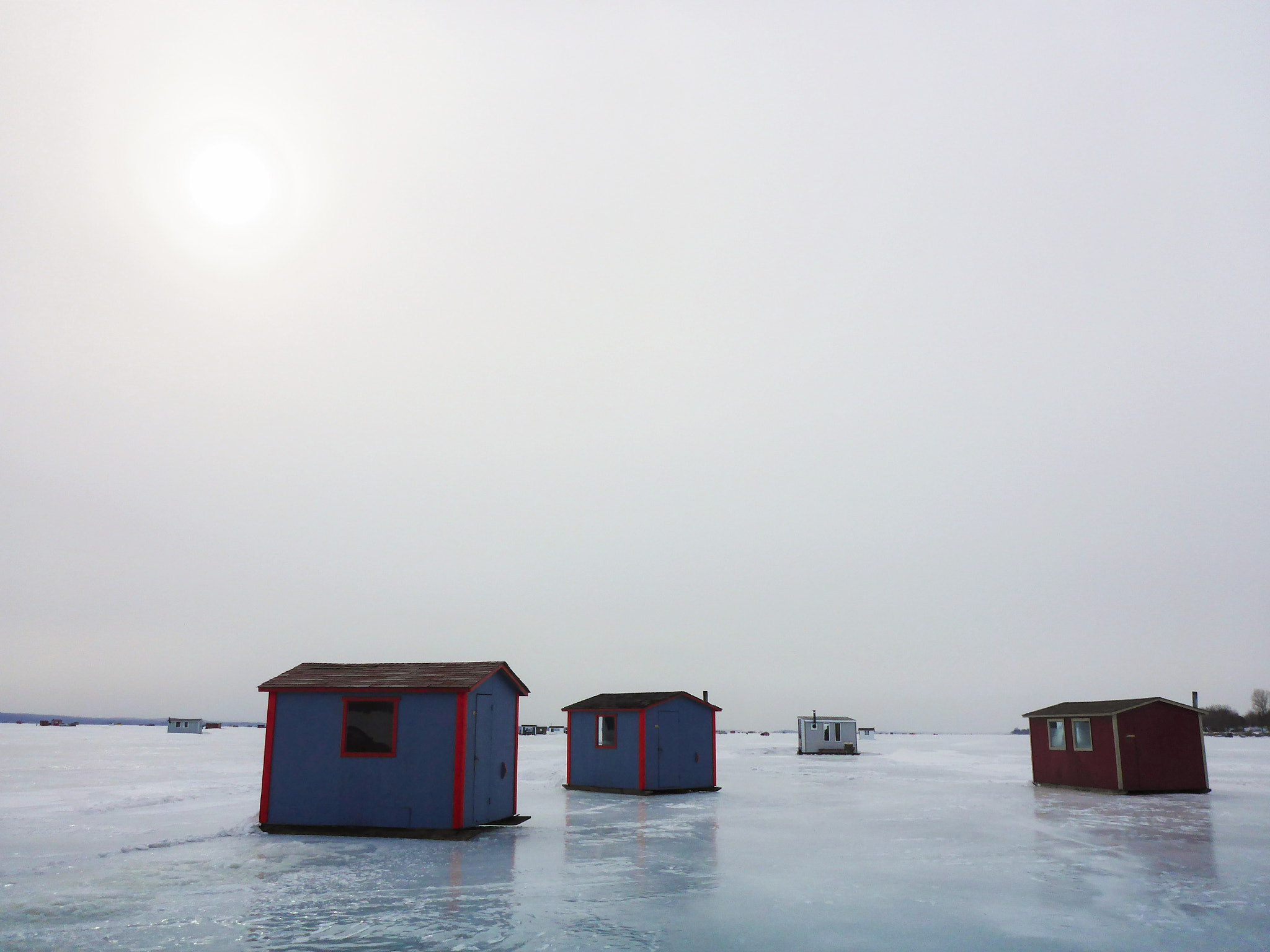 Panasonic Lumix DMC-TS5 (Lumix DMC-FT5) sample photo. Ice fishing cabins on lake champlain photography