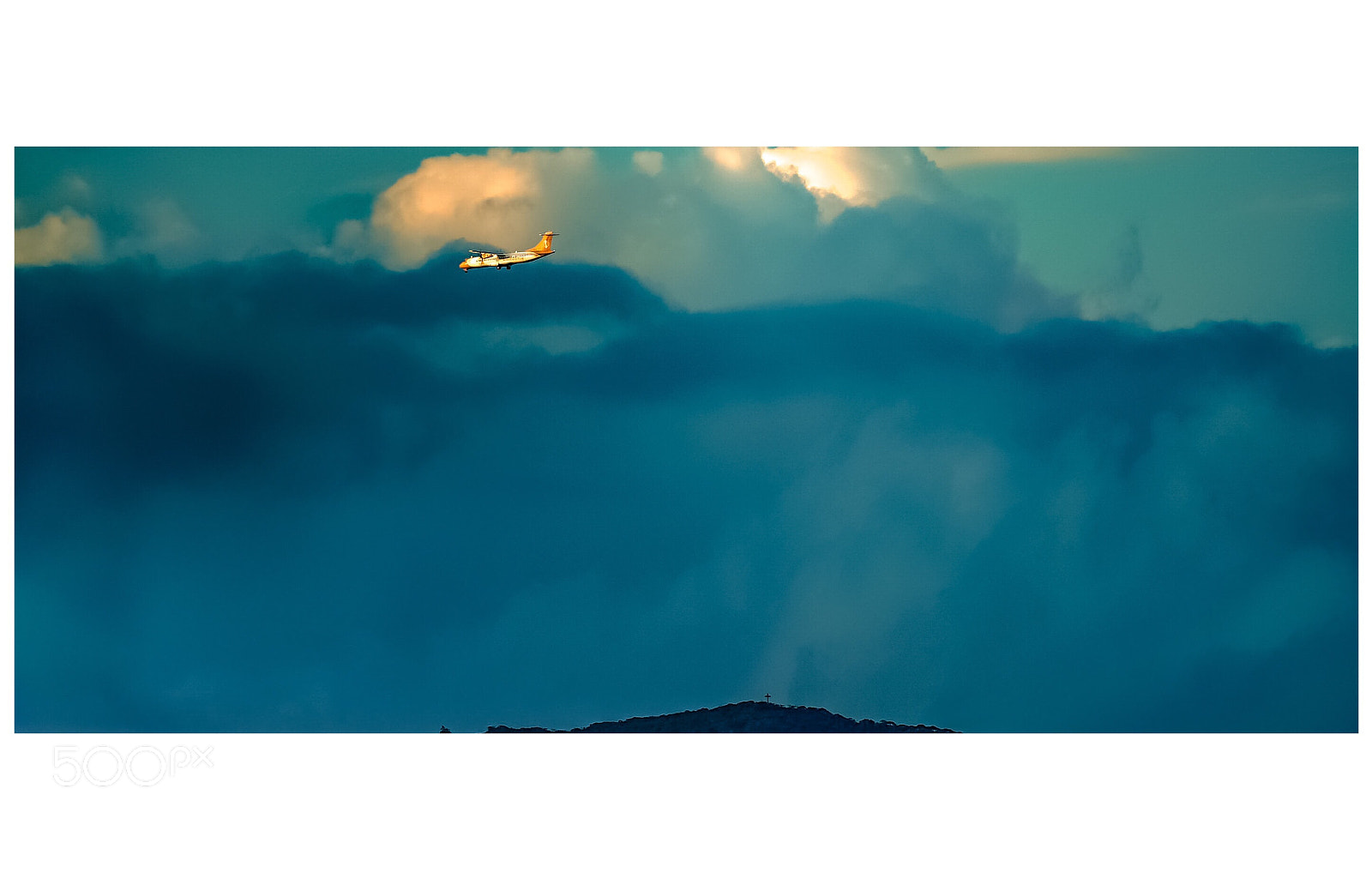 Sony a7S sample photo. Atr and sunset clouds. photography