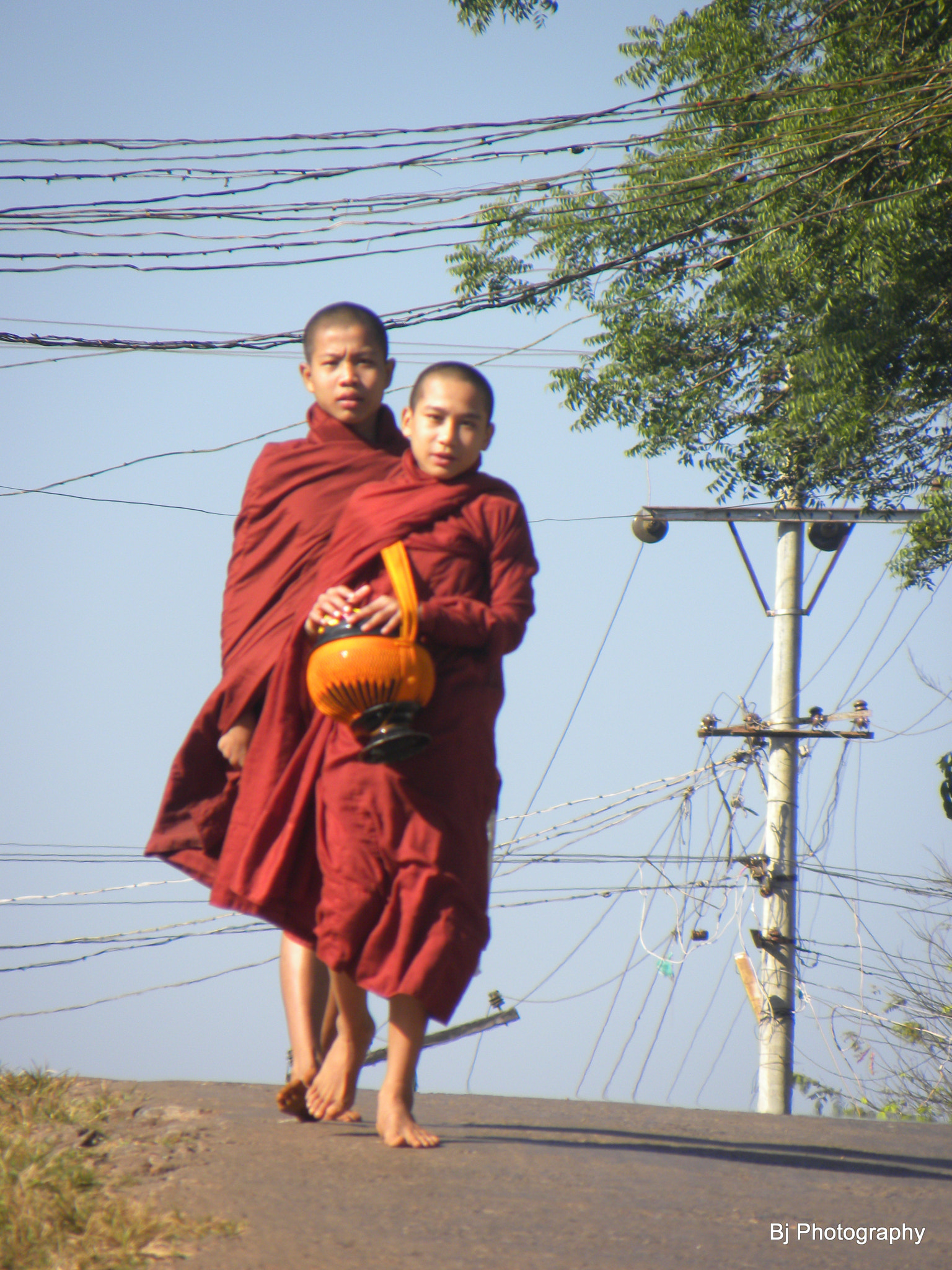 Nikon Coolpix P90 sample photo. Burmese monks on alms round photography