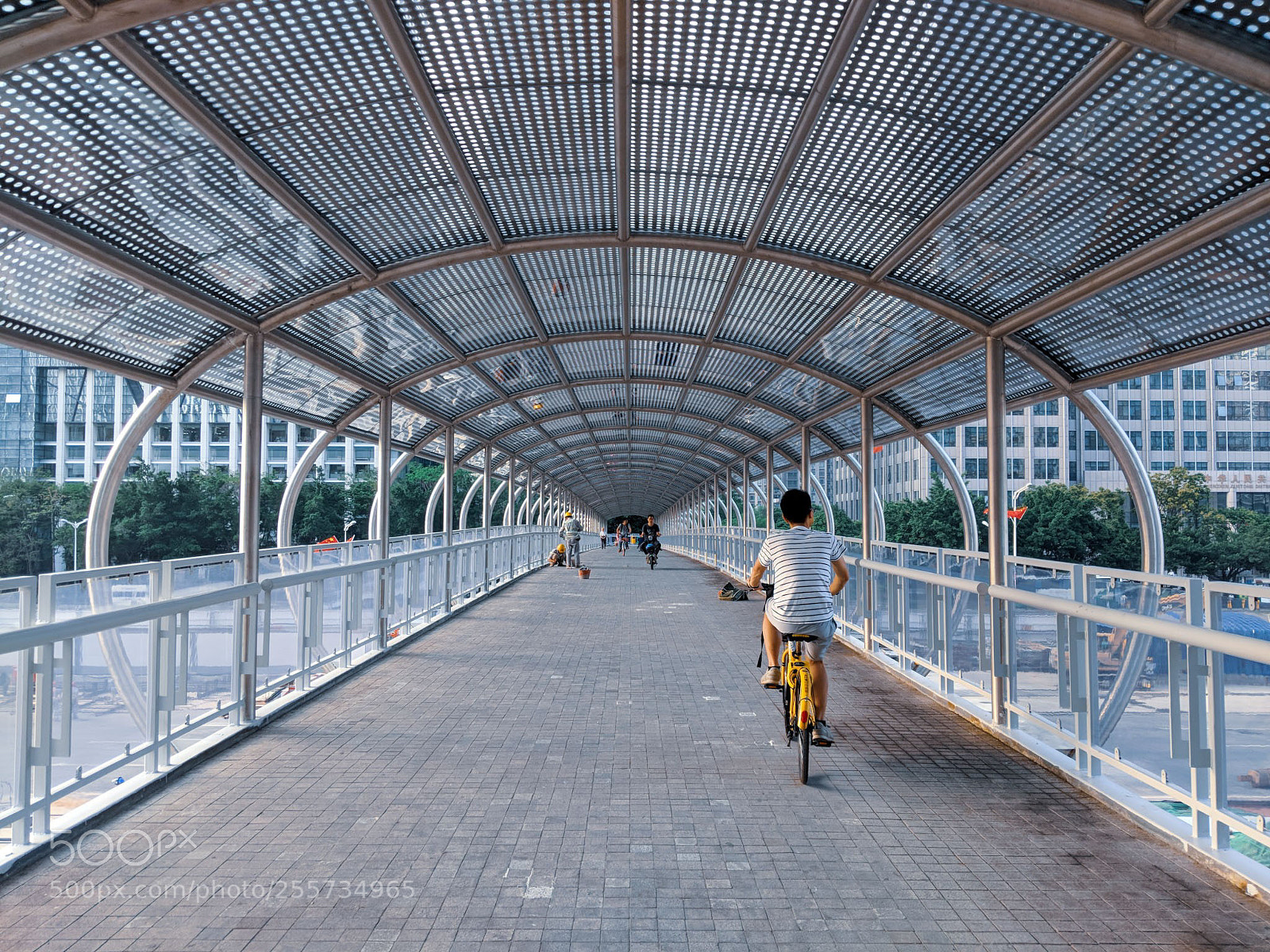 Google Pixel 2 sample photo. Biking on the footbridge photography