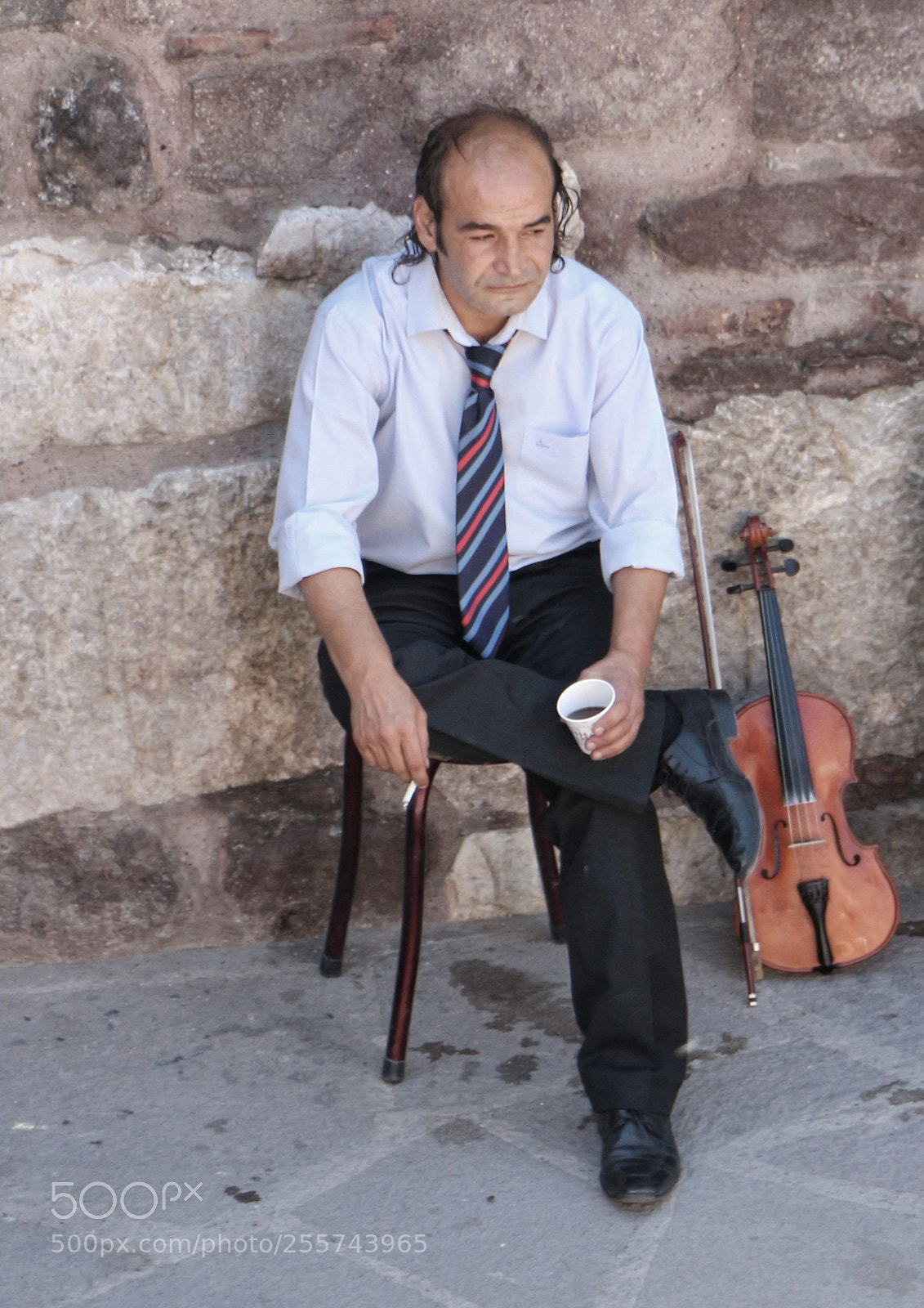 Canon EOS 700D (EOS Rebel T5i / EOS Kiss X7i) sample photo. Tired musician photography
