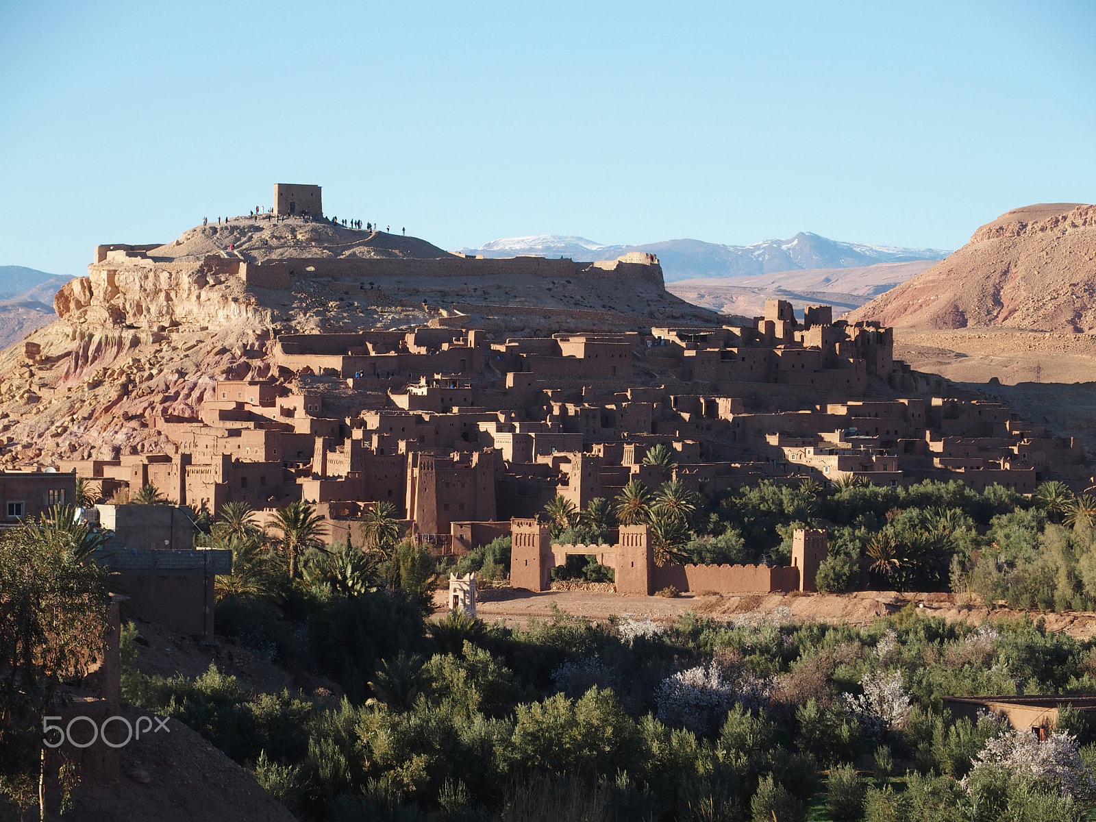 Olympus STYLUS1,1s sample photo. Kasbah ait ben haddou with green exotic palm trees at oasis on african atlas mountains range... photography