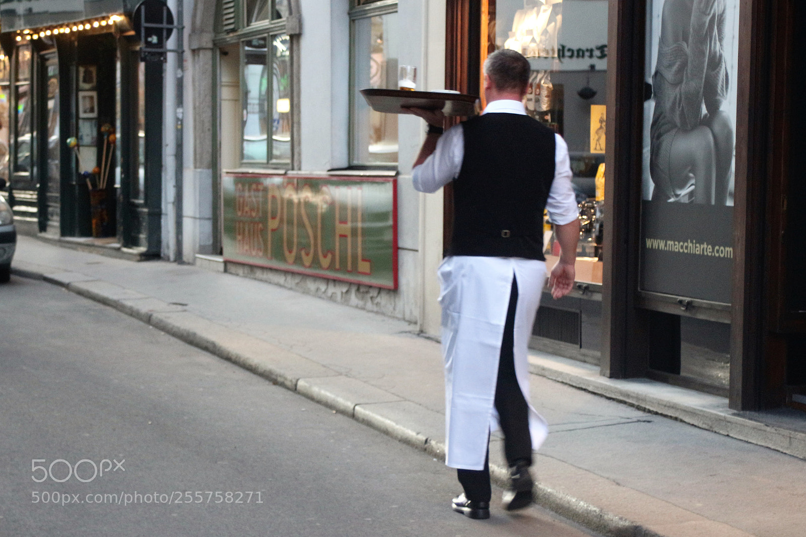 Canon EOS 100D (EOS Rebel SL1 / EOS Kiss X7) sample photo. A waiter on his photography