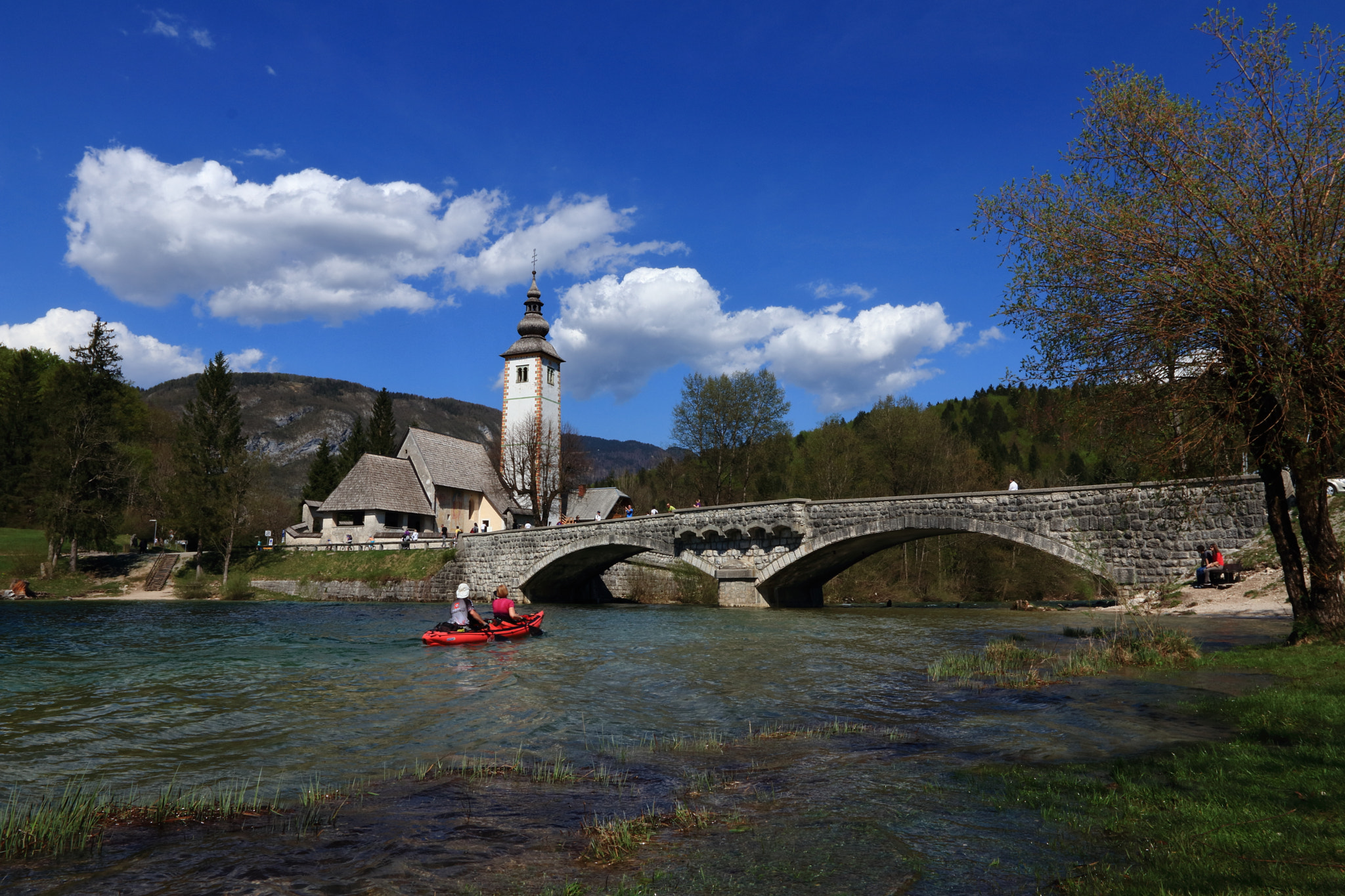 Canon EF 16-35mm F2.8L II USM sample photo. Red boat on lake bohinj in spring time photography