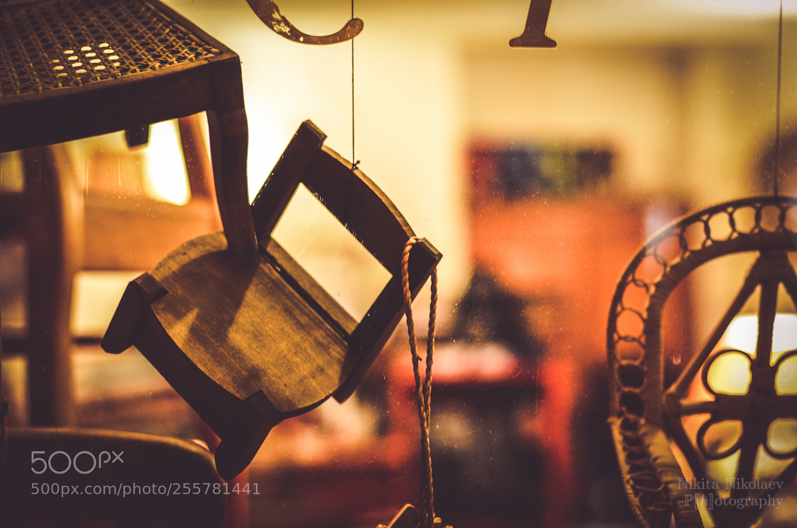 Nikon D7000 sample photo. A suspended chair photography