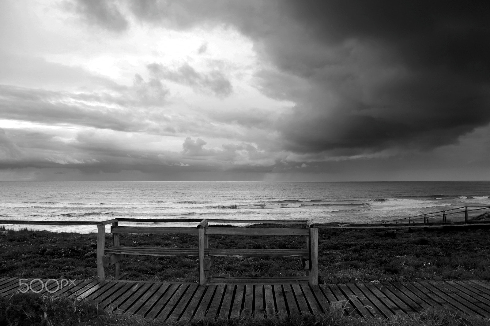 Canon EF-S 18-200mm F3.5-5.6 IS sample photo. Dark clouds photography