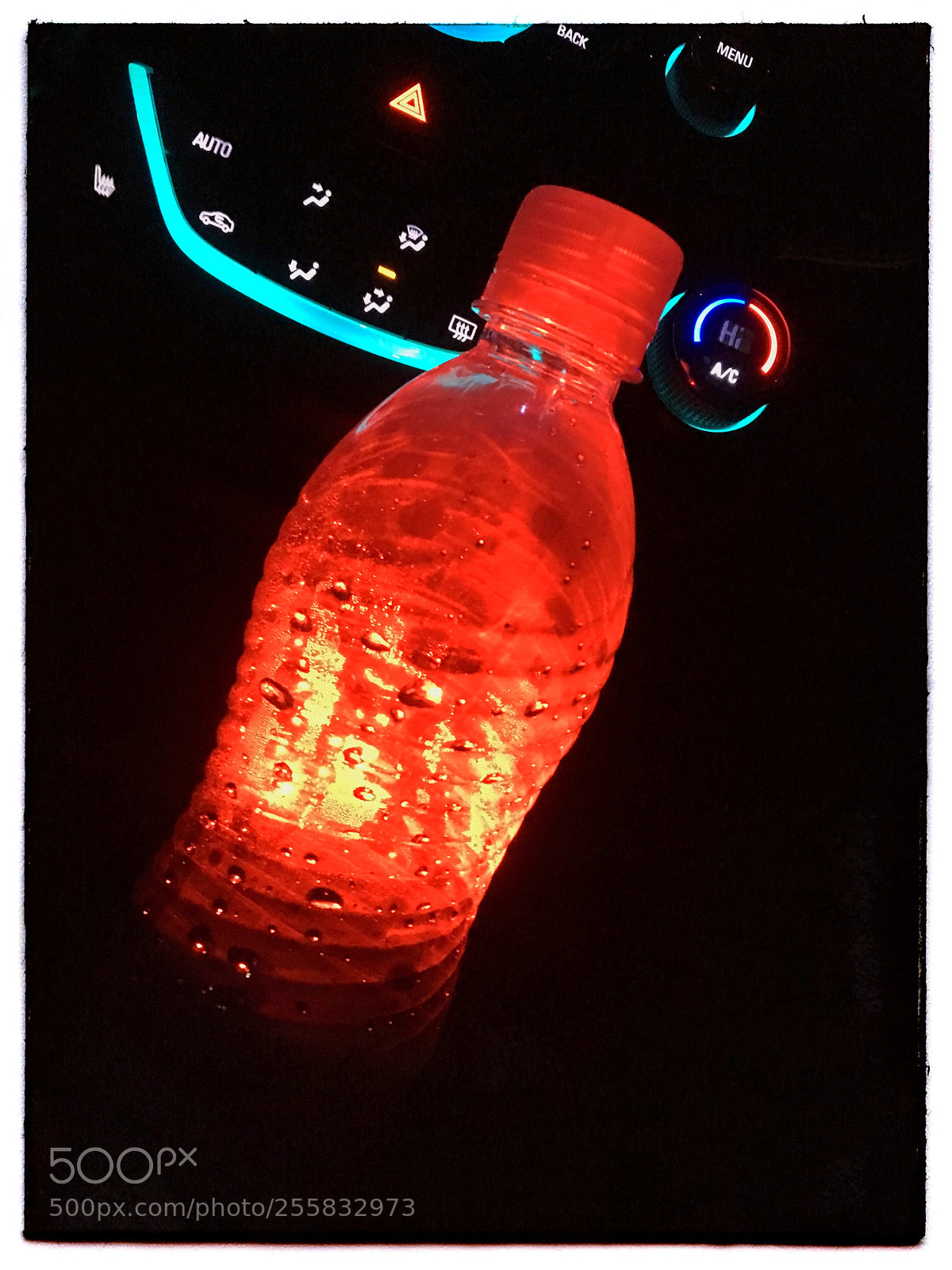 Apple iPhone SE sample photo. Glowing red bottle by photography