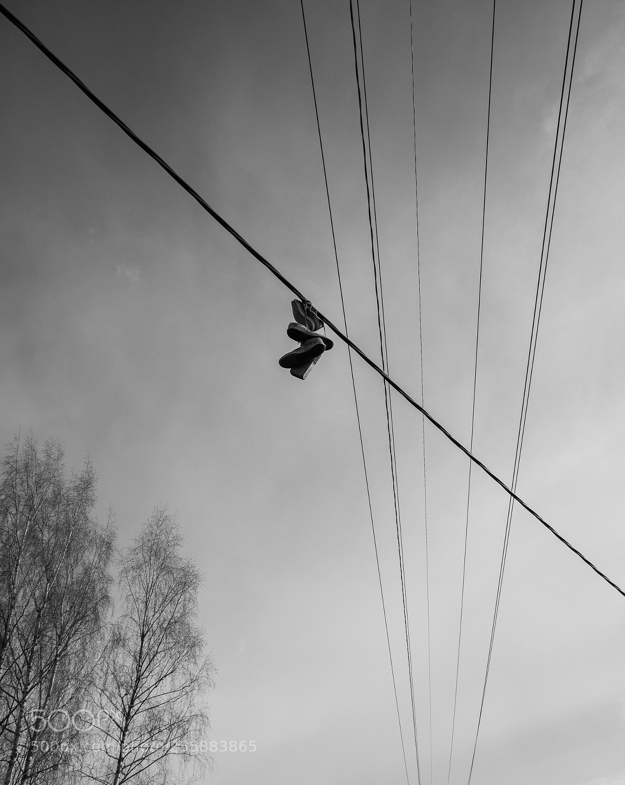 Panasonic Lumix DMC-G85 (Lumix DMC-G80) sample photo. Shoes on a powerline photography