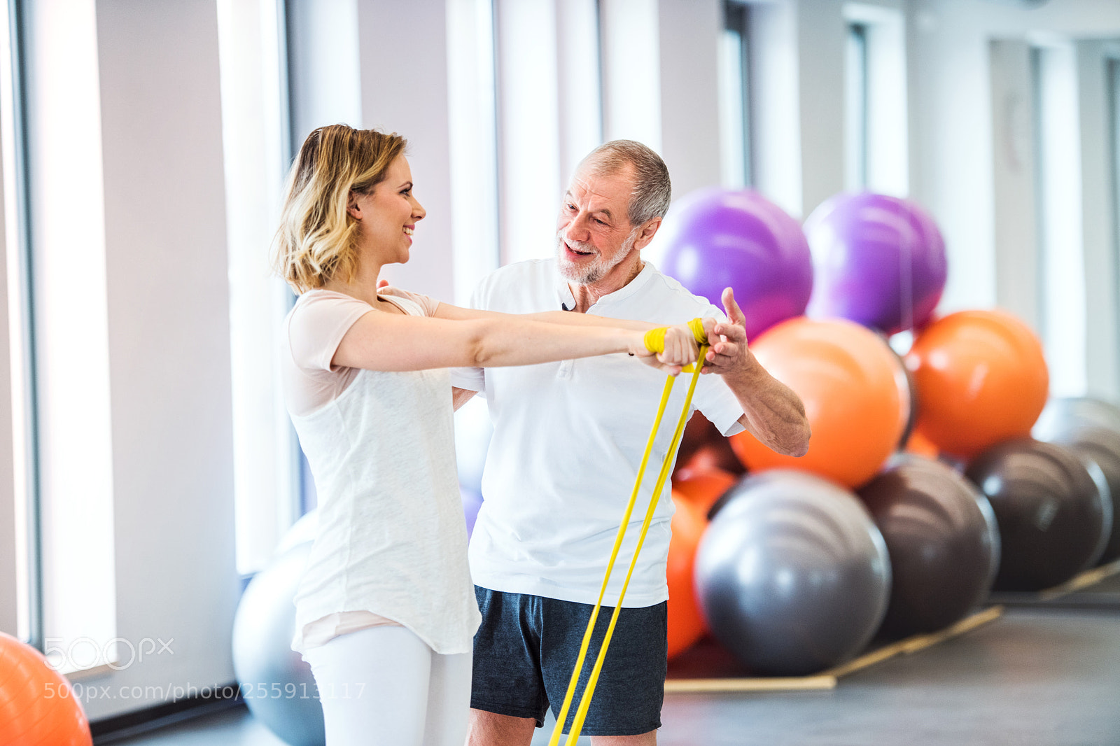 Nikon D5 sample photo. Senior male physiotherapist working photography