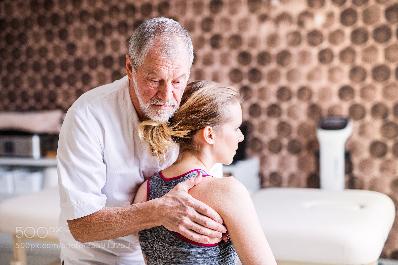 Nikon D5 sample photo. Senior physiotherapist working with photography