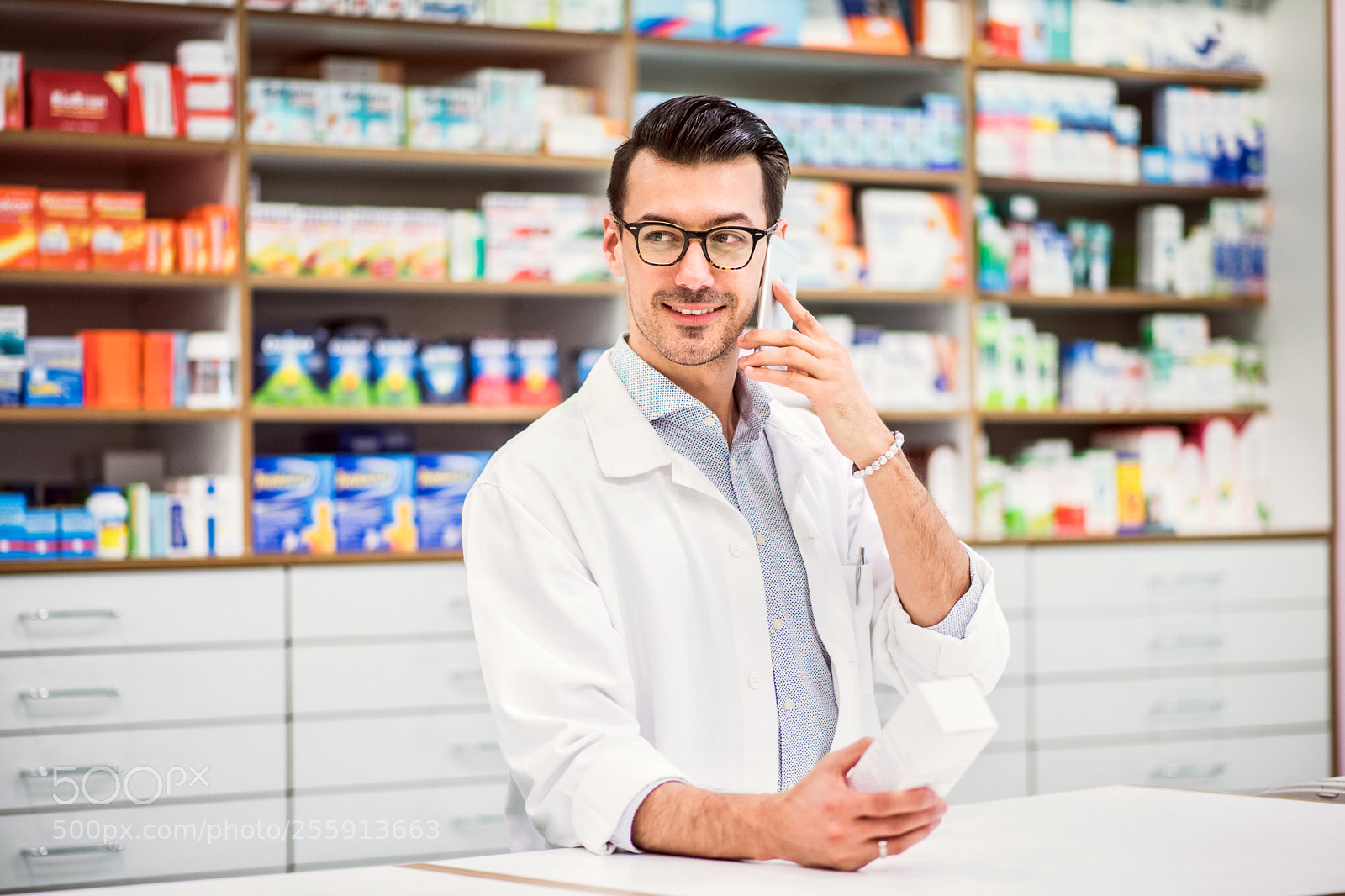 Nikon D5 sample photo. Young friendly male pharmacist photography