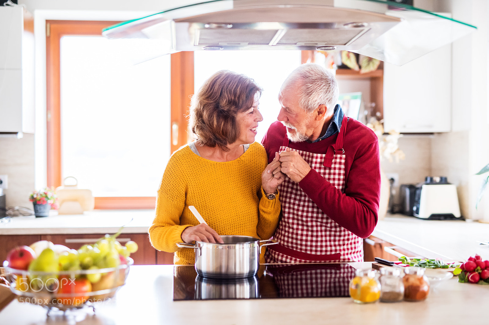 Nikon D5 sample photo. Happy senior couple cooking photography