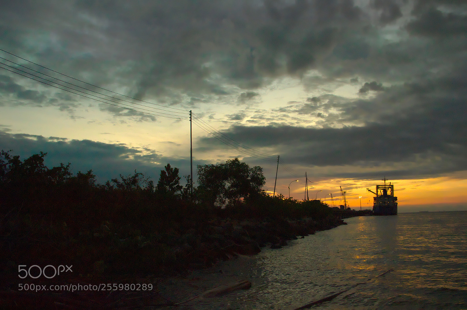 Canon EF-S 18-135mm F3.5-5.6 IS sample photo. Sunset at a jetty photography