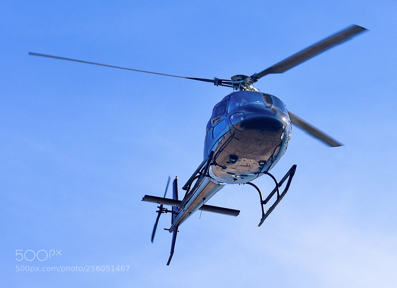 Nikon D7200 sample photo. Blue helicopter flying over photography