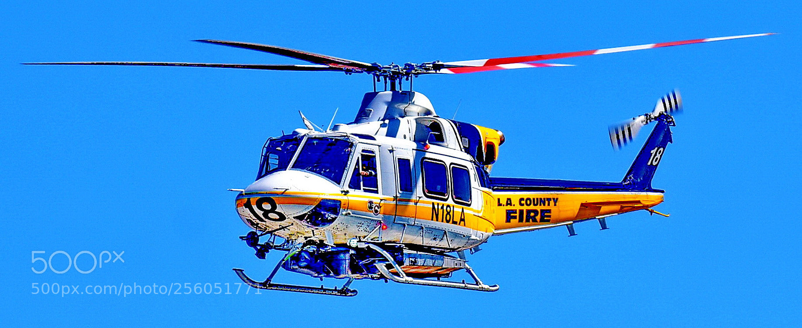Nikon D7200 sample photo. Helicopter flying over marina photography