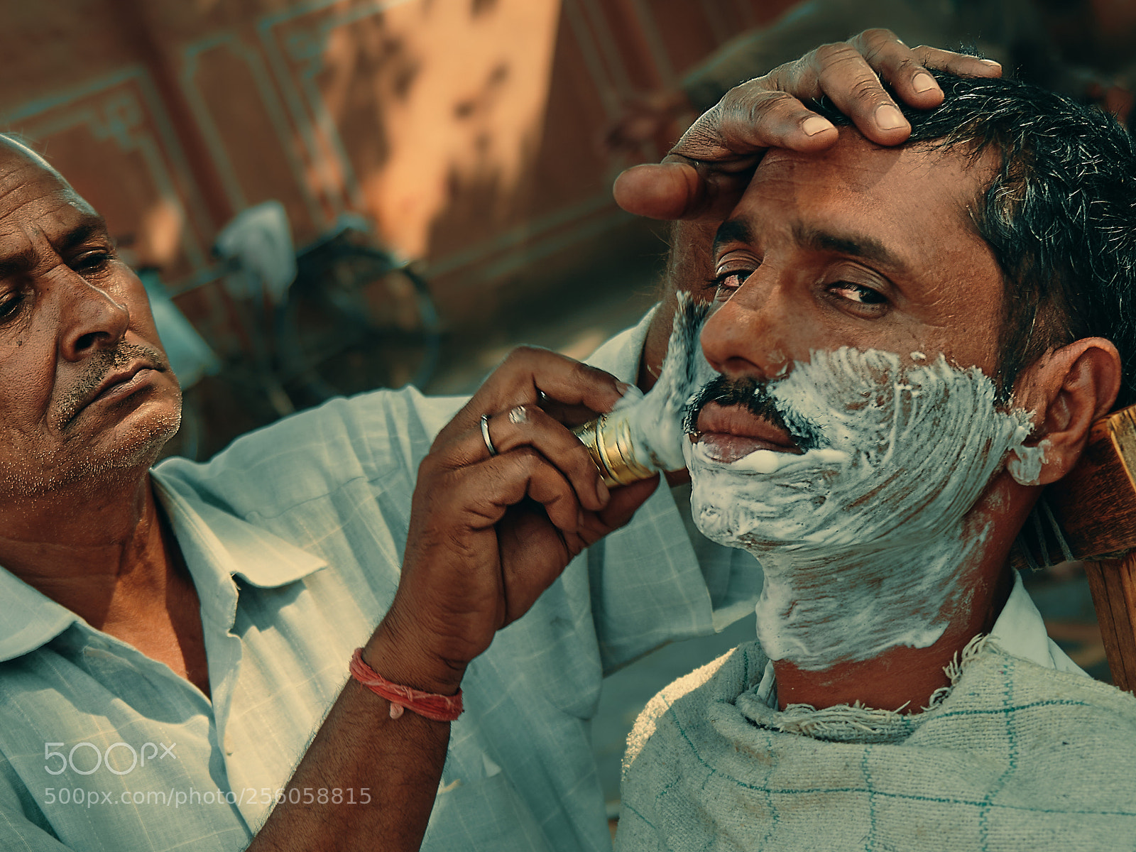 Olympus OM-D E-M1 Mark II sample photo. Street barber shop photography
