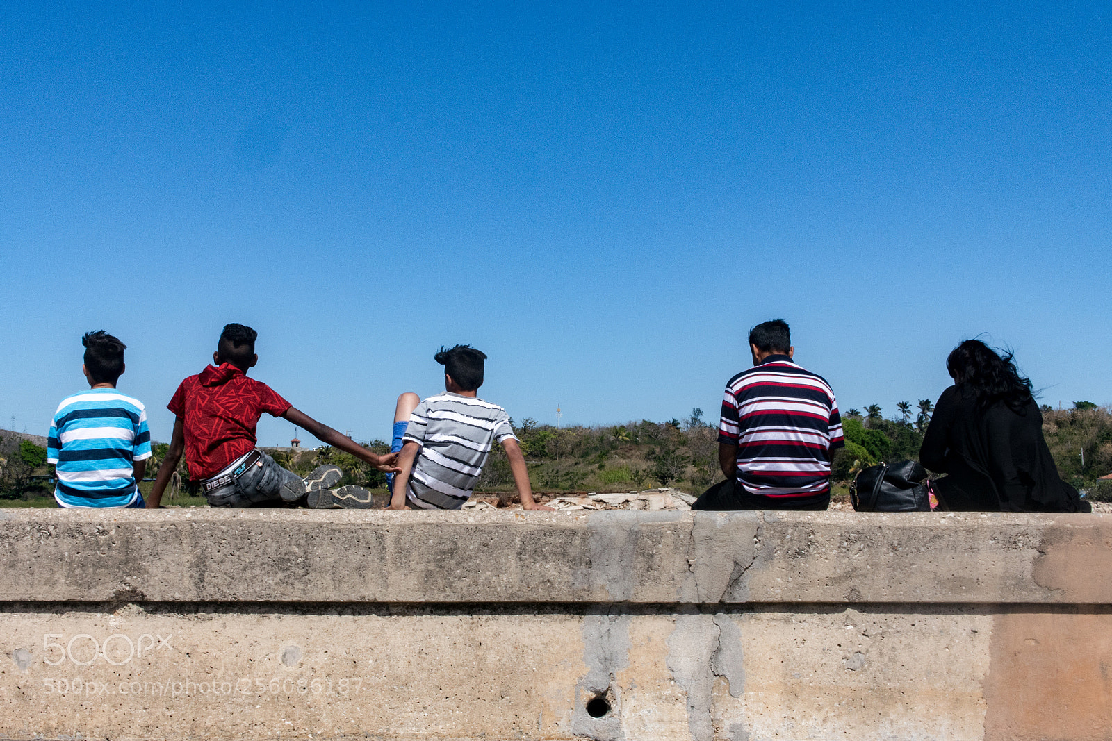 Nikon 1 J5 sample photo. People sitting along the photography