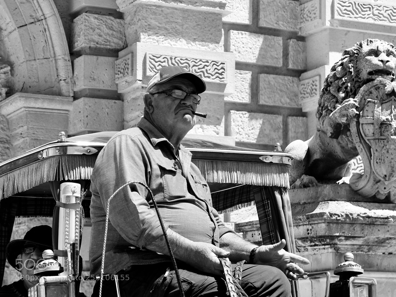 Fujifilm X10 sample photo. Coachman with a cigar photography