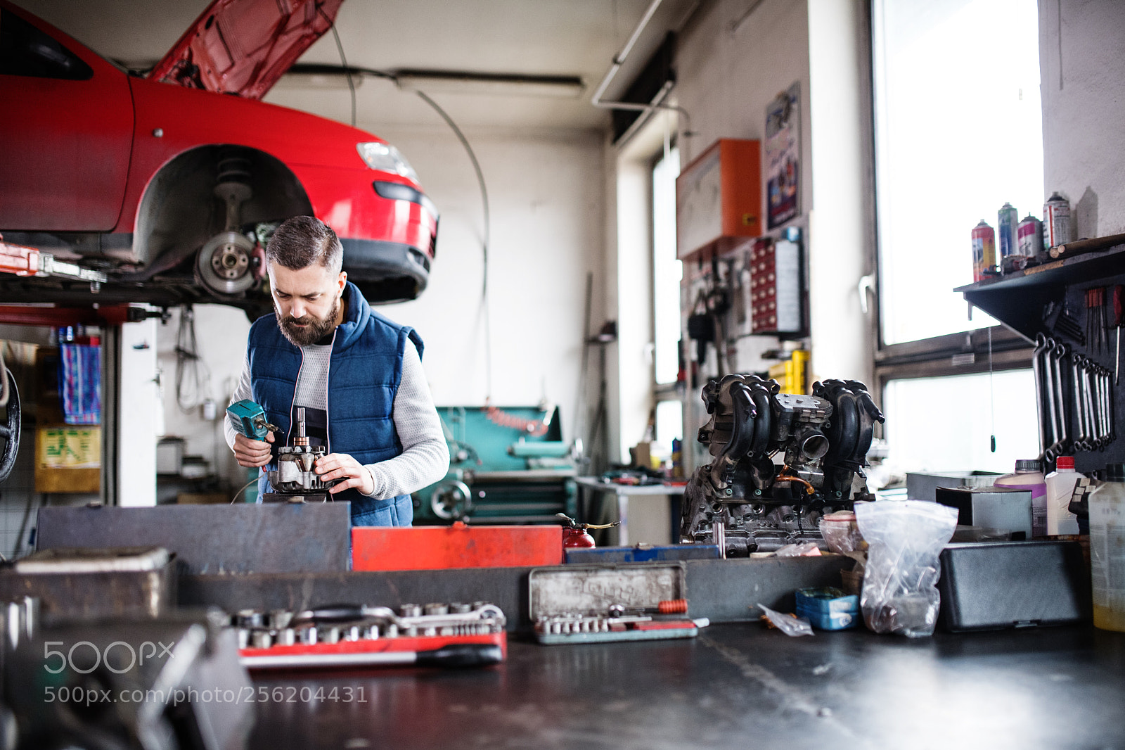 Nikon D5 sample photo. Man mechanic repairing a photography