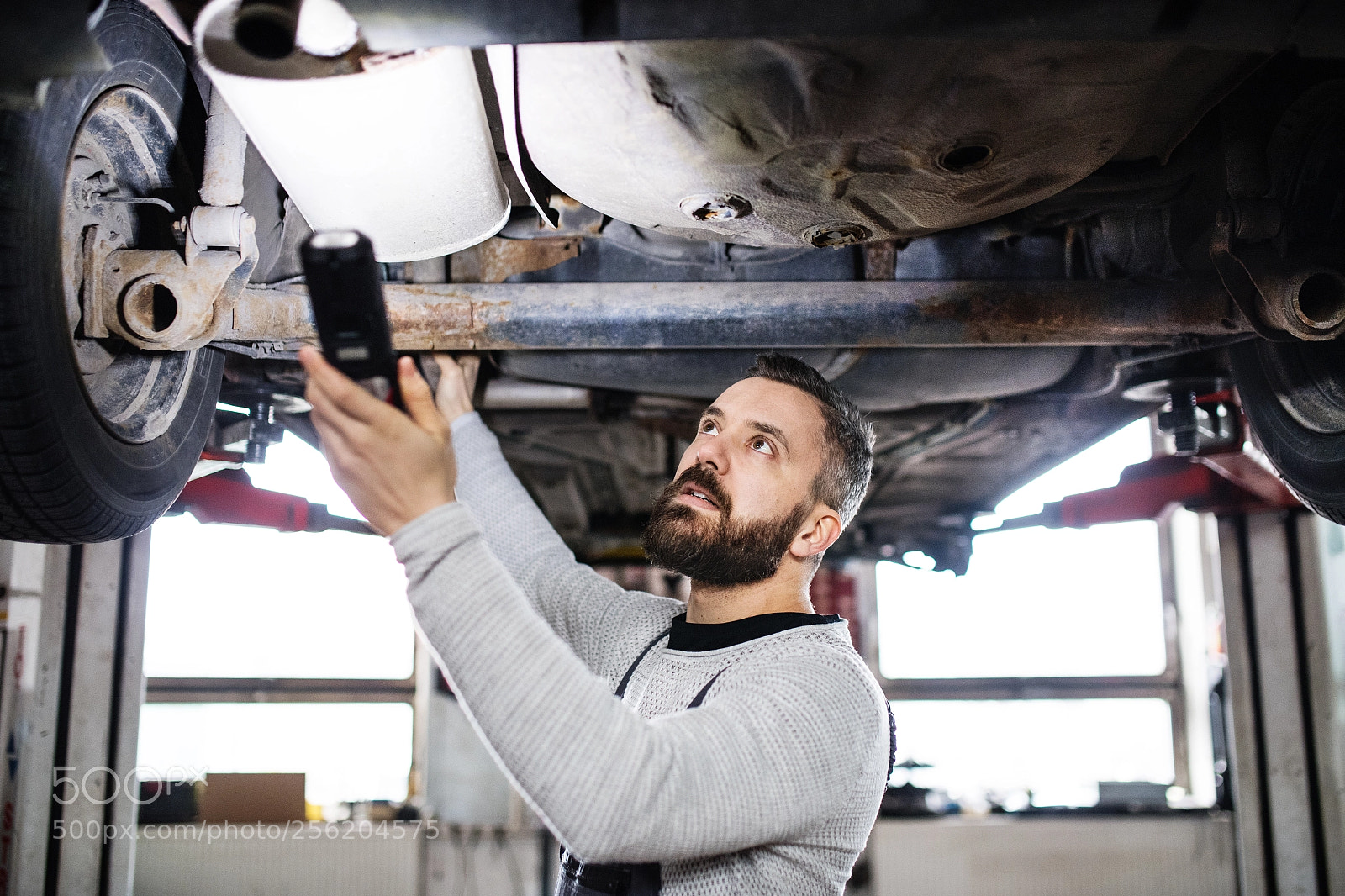 Nikon D5 sample photo. Man mechanic repairing a photography