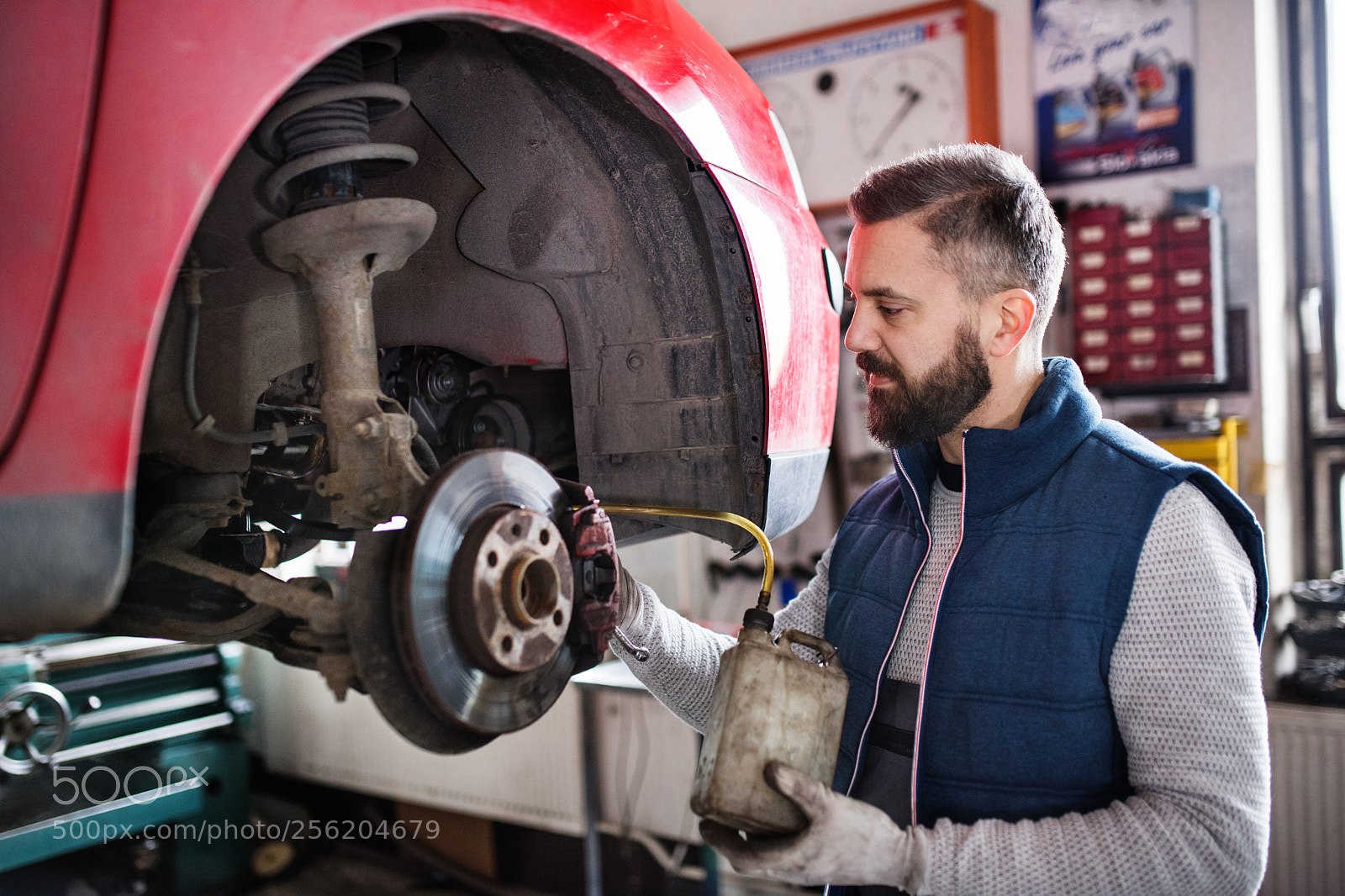 Nikon D5 sample photo. Man mechanic repairing a photography