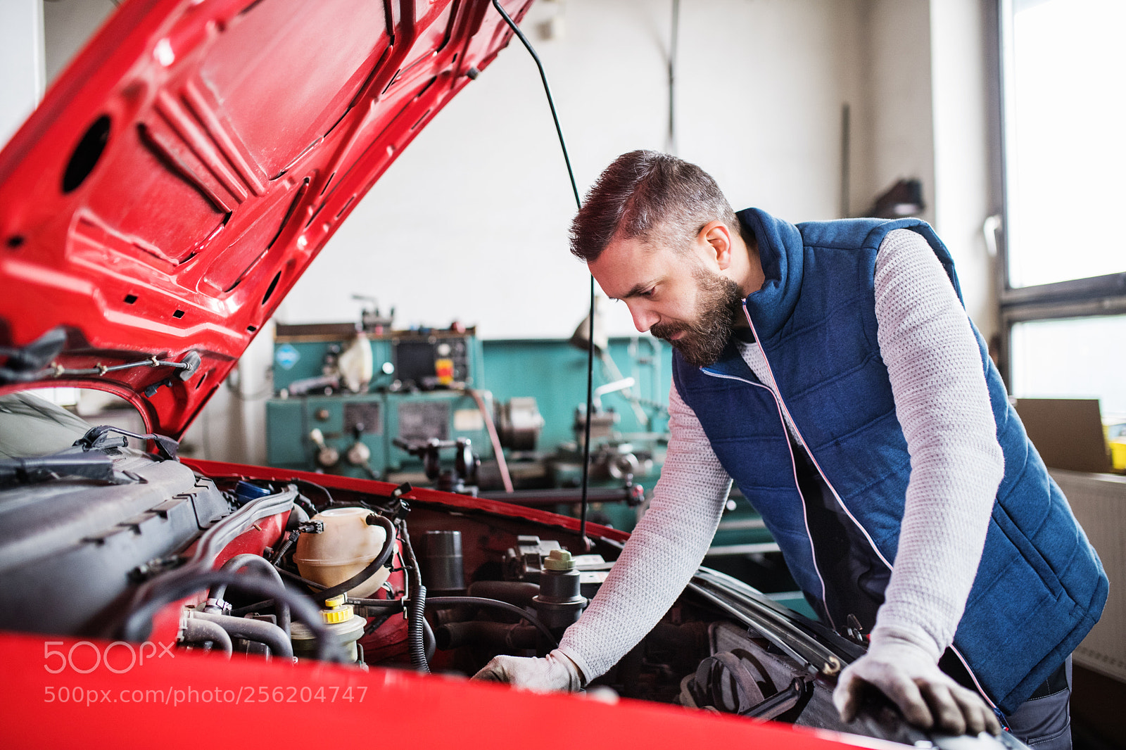 Nikon D5 sample photo. Man mechanic repairing a photography