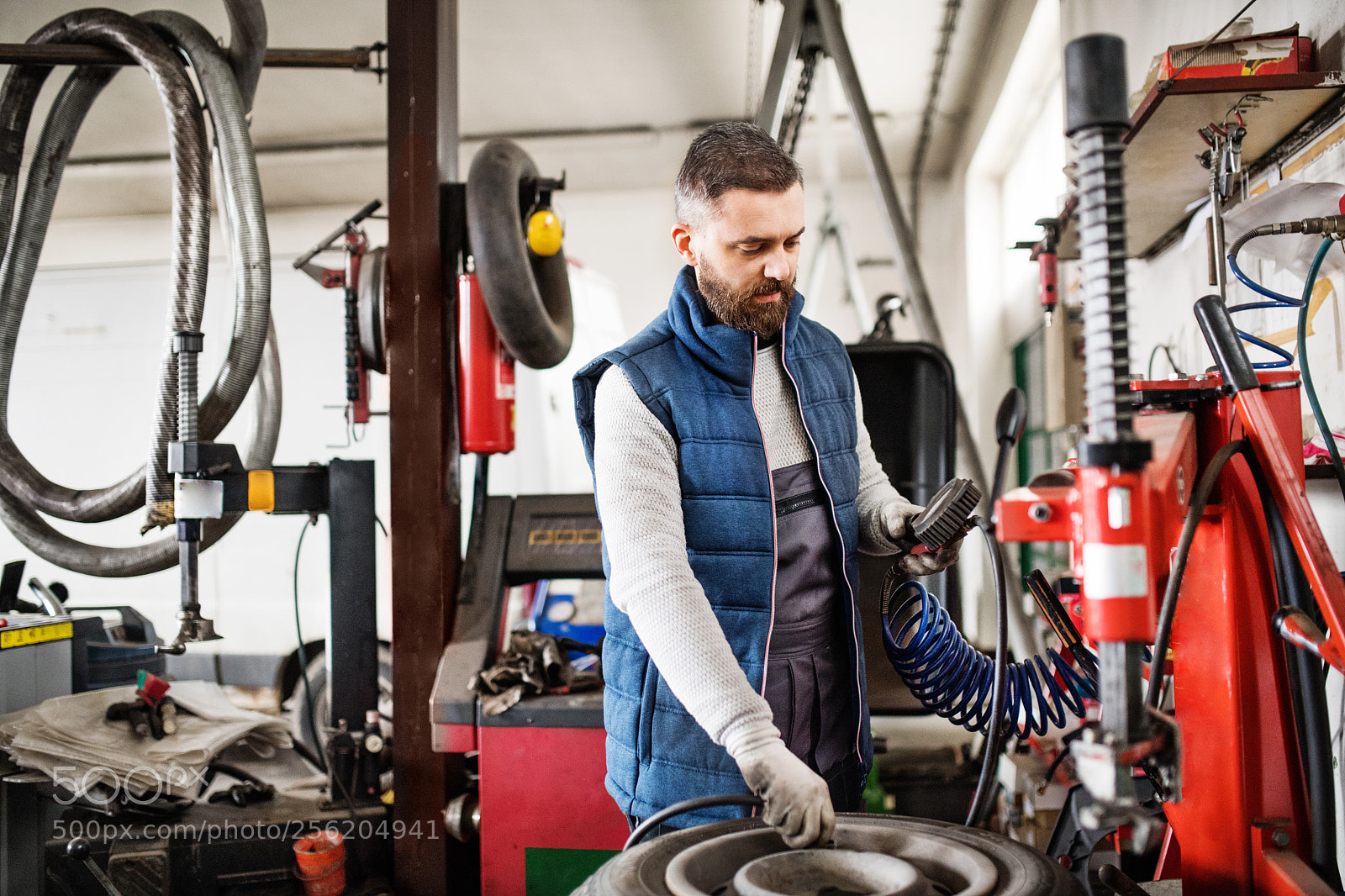 Nikon D5 sample photo. Man mechanic repairing a photography