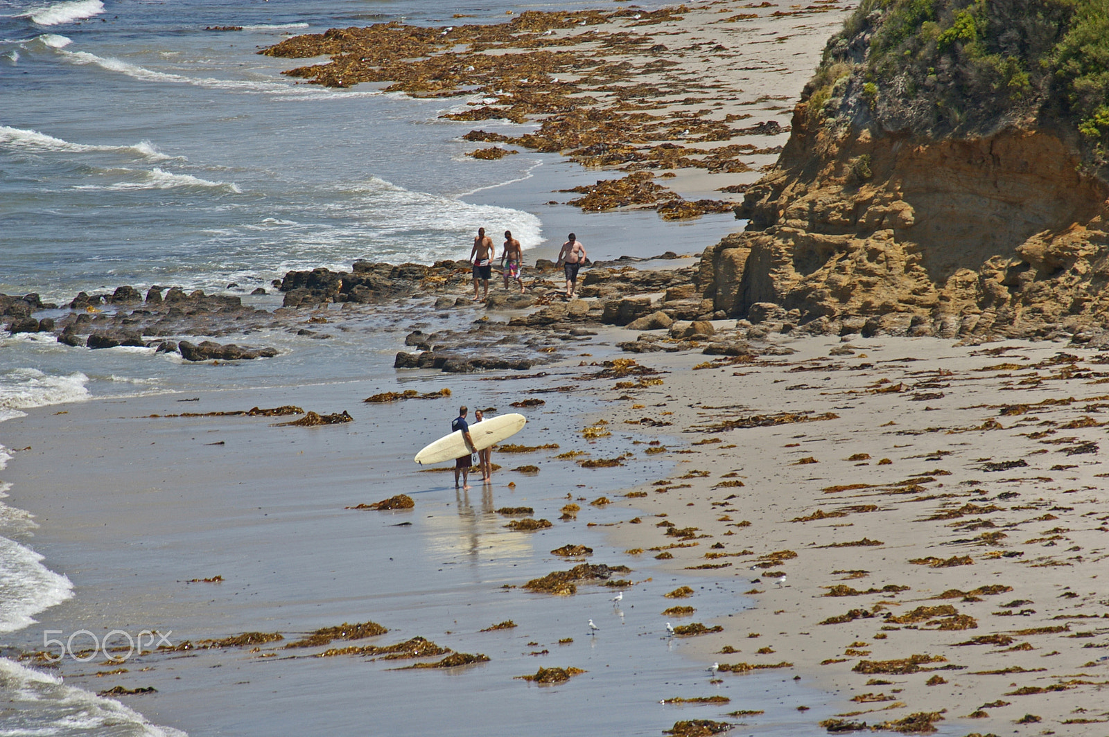 Pentax K100D sample photo. Surfer on the beach photography