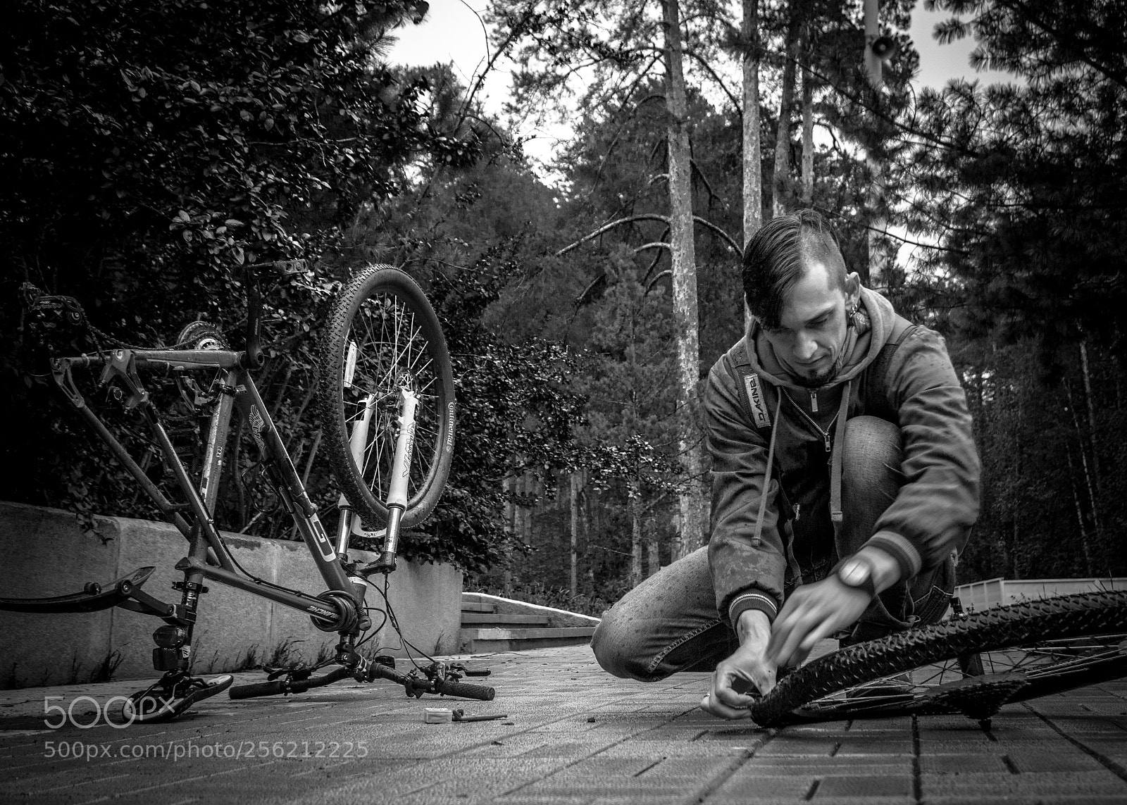 Sony a6000 sample photo. Repairing a bike photography