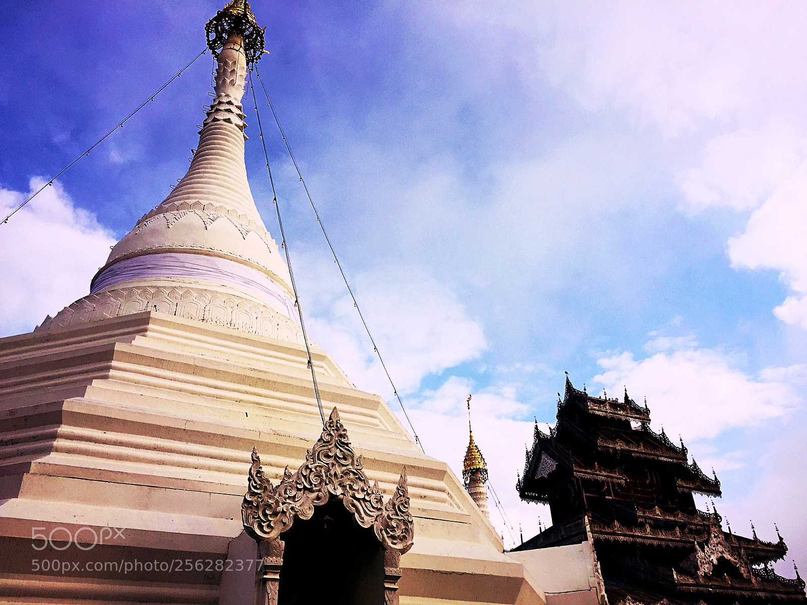 Apple iPhone 6 sample photo. Tribal style pagoda with photography