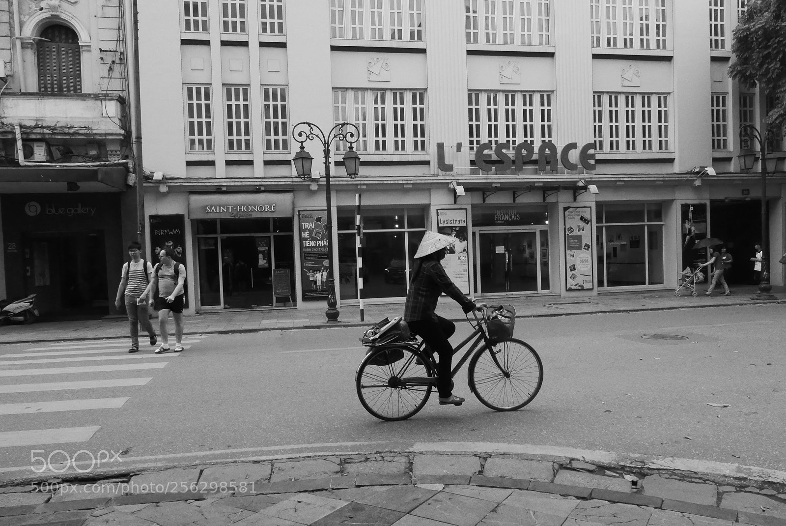 Panasonic Lumix DMC-LX100 sample photo. A woman riding bicycle photography