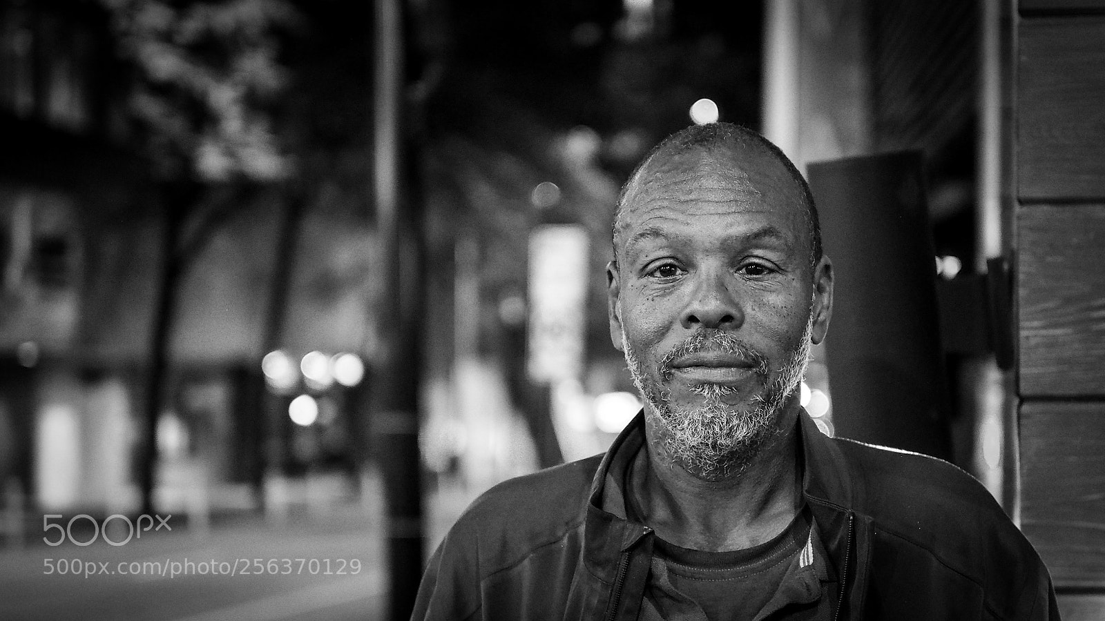 Olympus OM-D E-M10 sample photo. Random guy in downtown photography