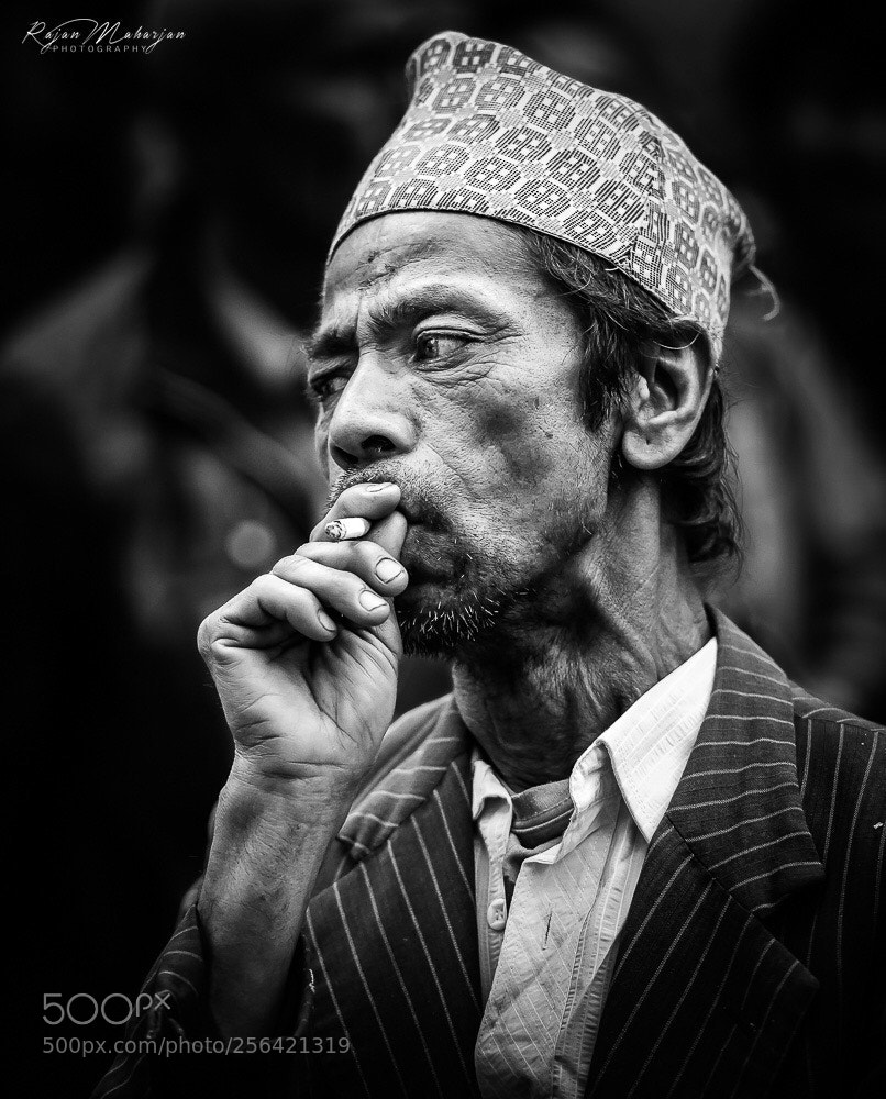 Nikon D750 sample photo. Smoking in nepali style photography