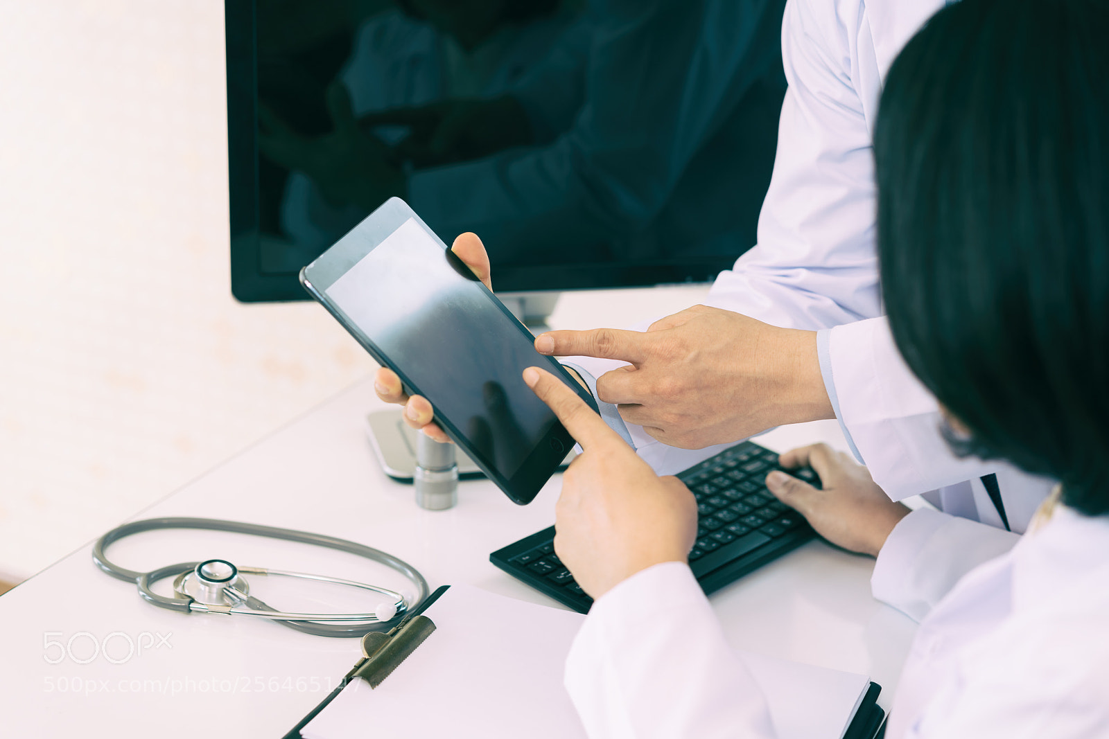 Sony a7R II sample photo. Two doctors analysing and photography