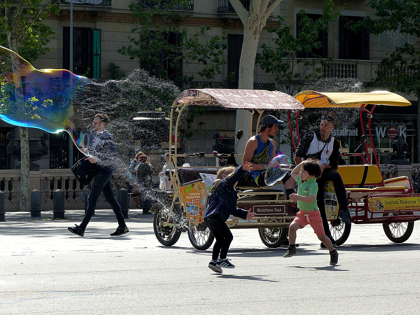 Panasonic Lumix DMC-FZ200 sample photo. Playing with bubbles photography