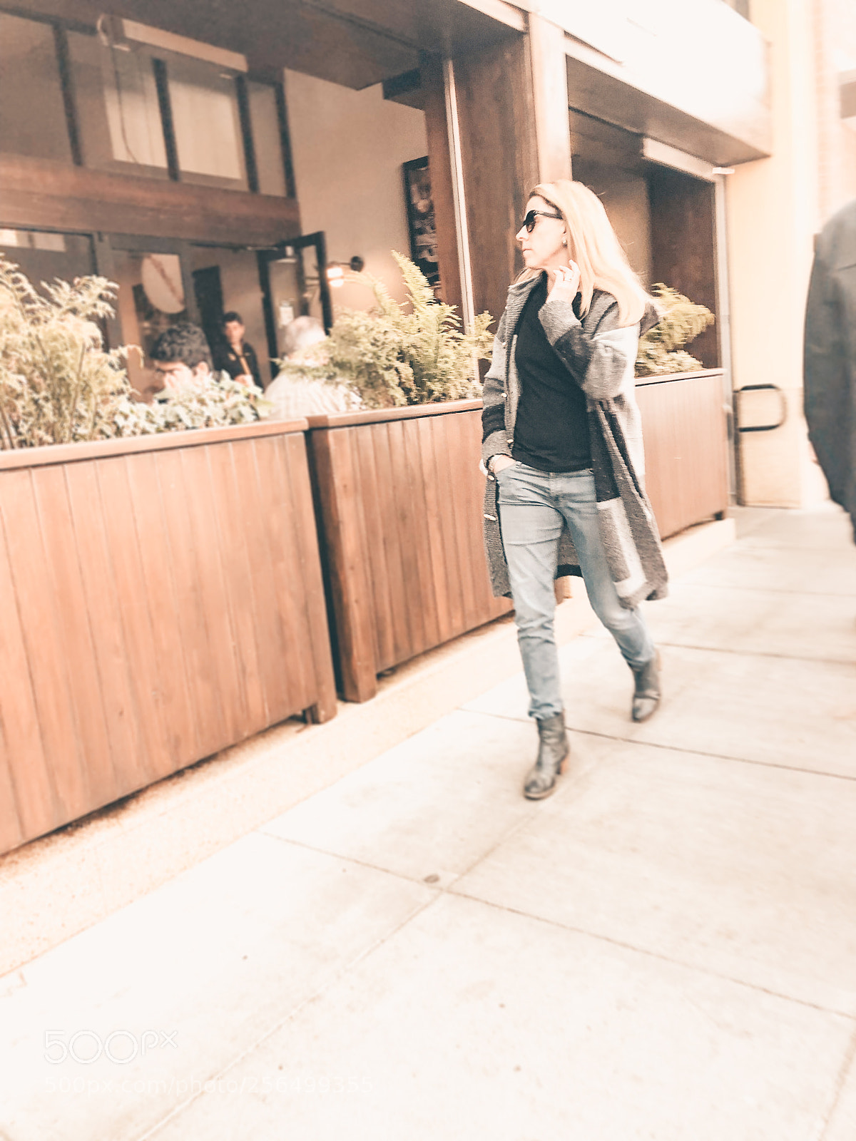 Apple iPhone X sample photo. Woman walking photography