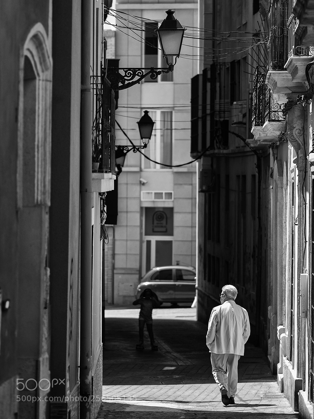 Olympus OM-D E-M1 sample photo. The man in black photography