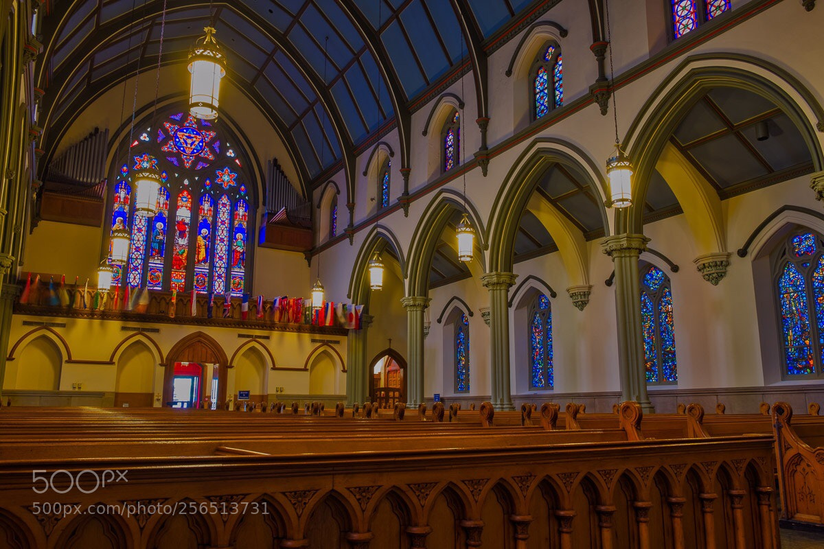 Fujifilm X-E3 sample photo. Flags with church photography
