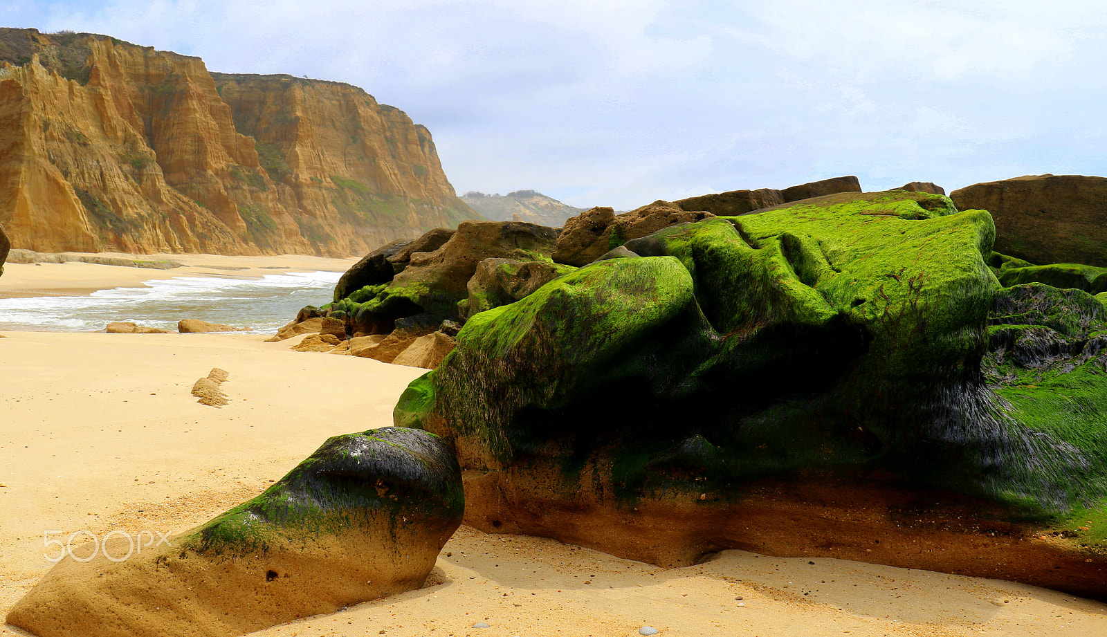 Canon EF 24-70mm F4L IS USM sample photo. Sand, rocks and cliffs photography