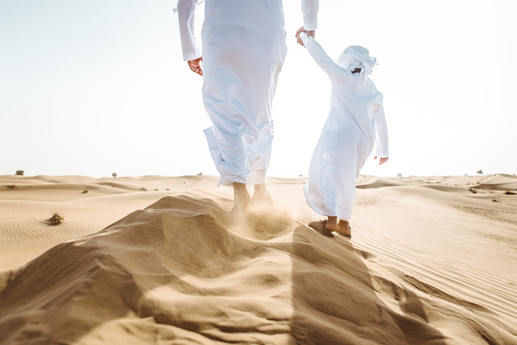 father and son spending time in the desert by Cristian Negroni on 500px.com