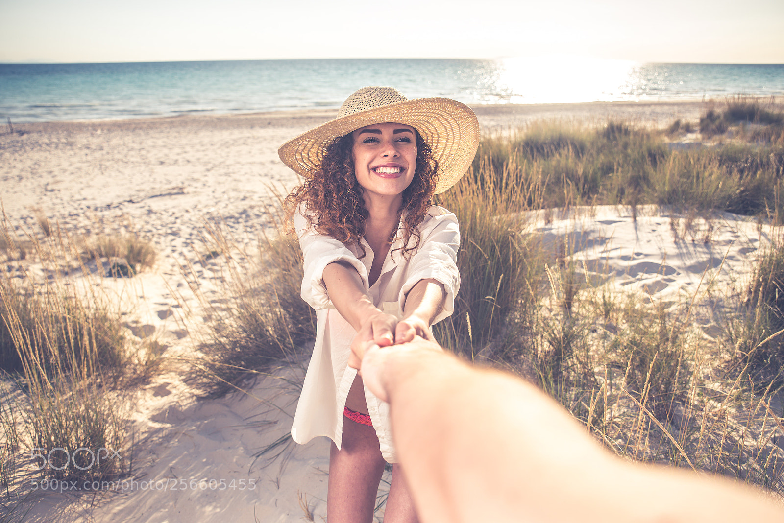 Nikon D610 sample photo. Young couple sharing happy photography