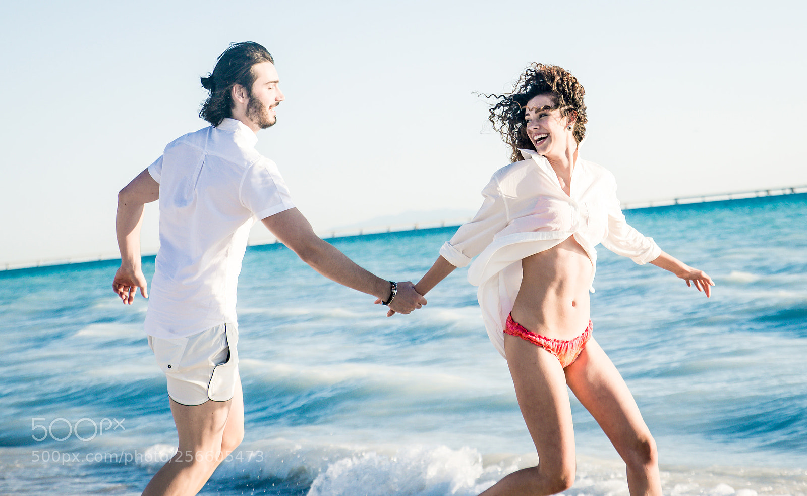 Nikon D610 sample photo. Young couple sharing happy photography