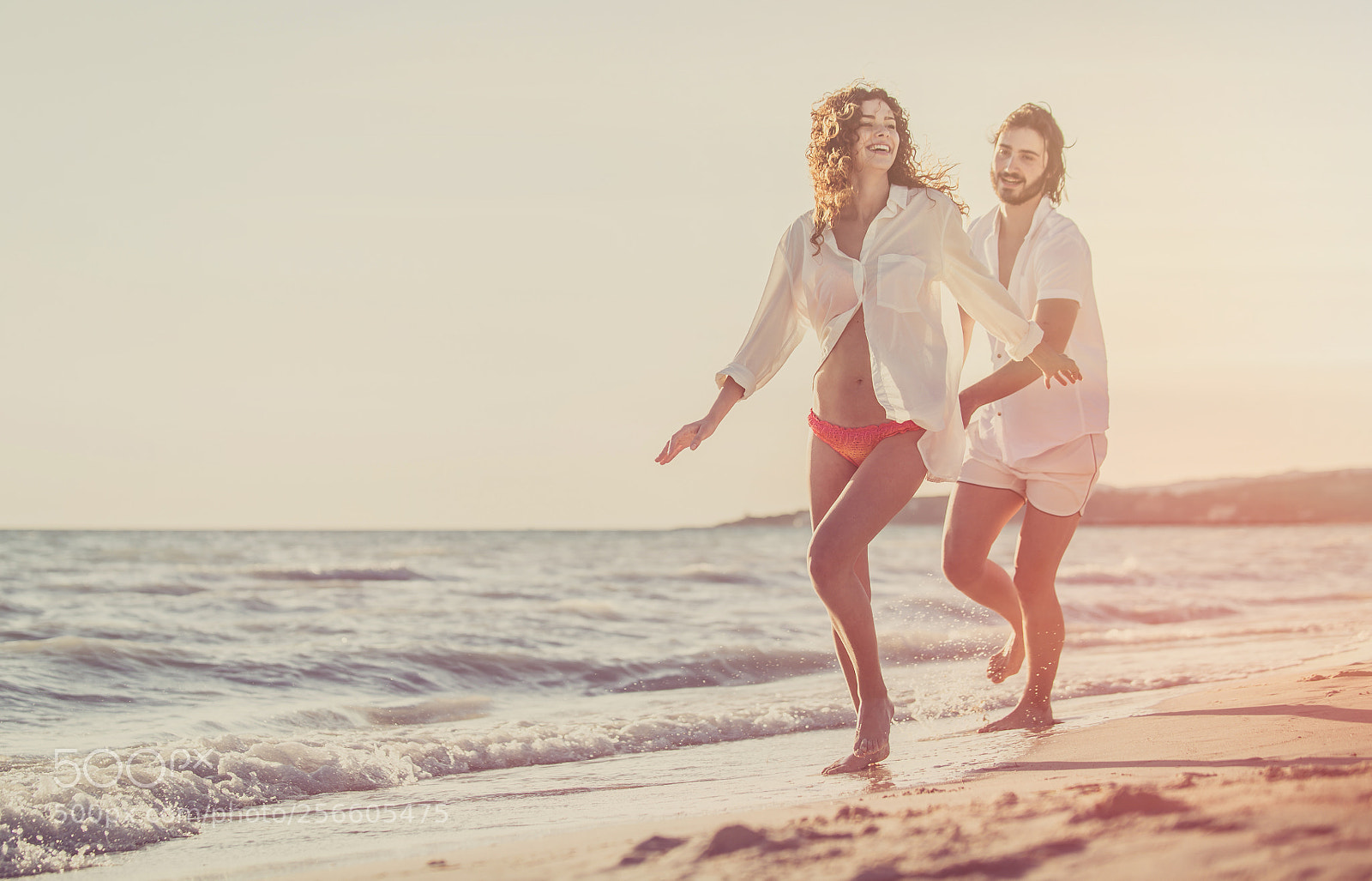 Nikon D610 sample photo. Young couple sharing happy photography