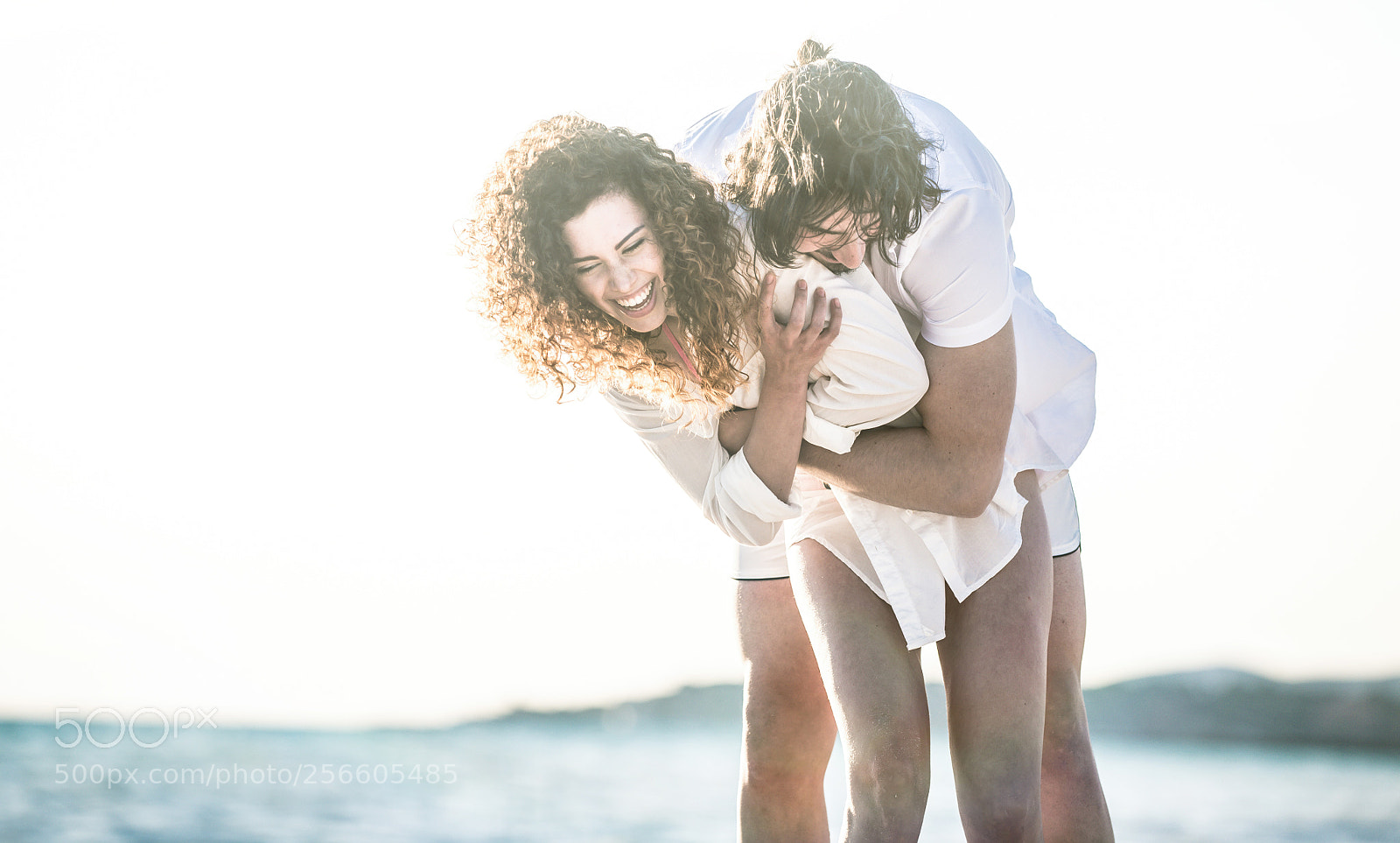 Nikon D610 sample photo. Young couple sharing happy photography