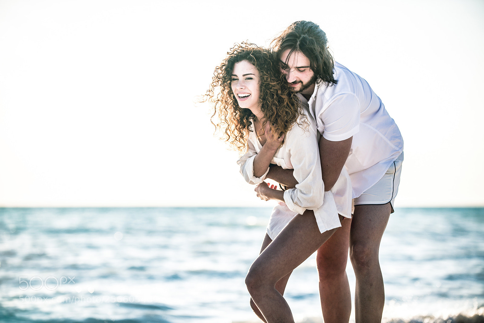 Nikon D610 sample photo. Young couple sharing happy photography